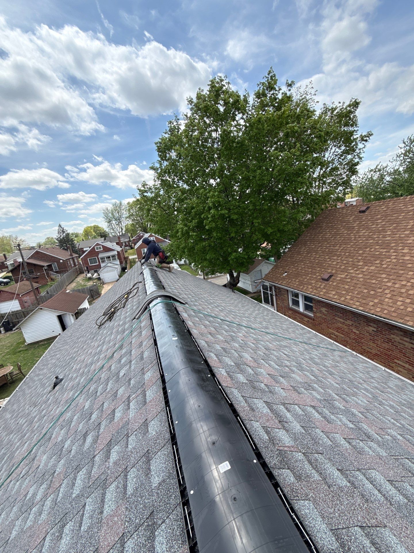 Full Residential Roof Installation and Detached Garage Shingle Replacement in St. Louis by Acute Roofing And Exteriors 