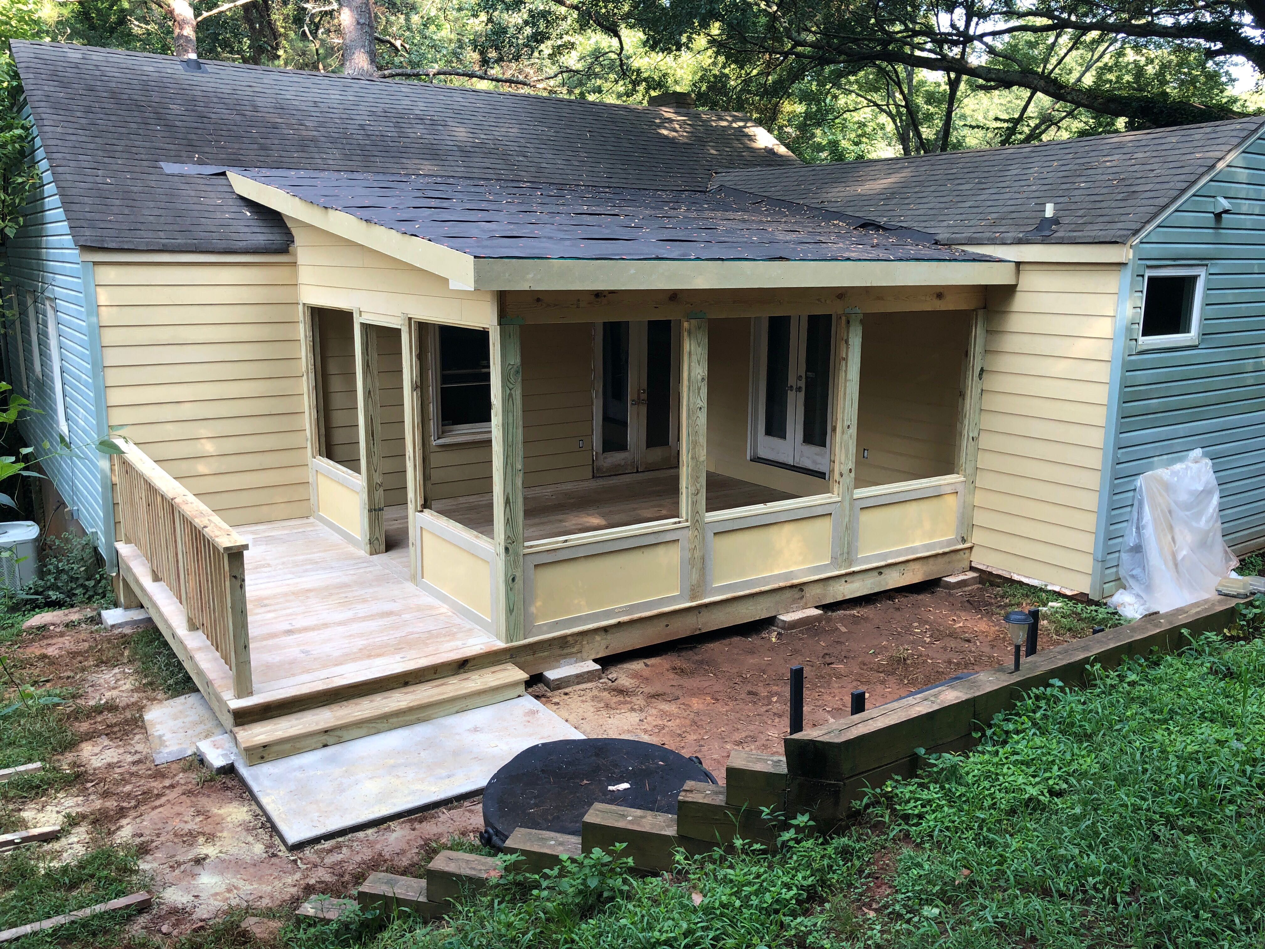 Custom Screened Porch with Metal Roof and Deck in Decatur by Swift Home Renovations