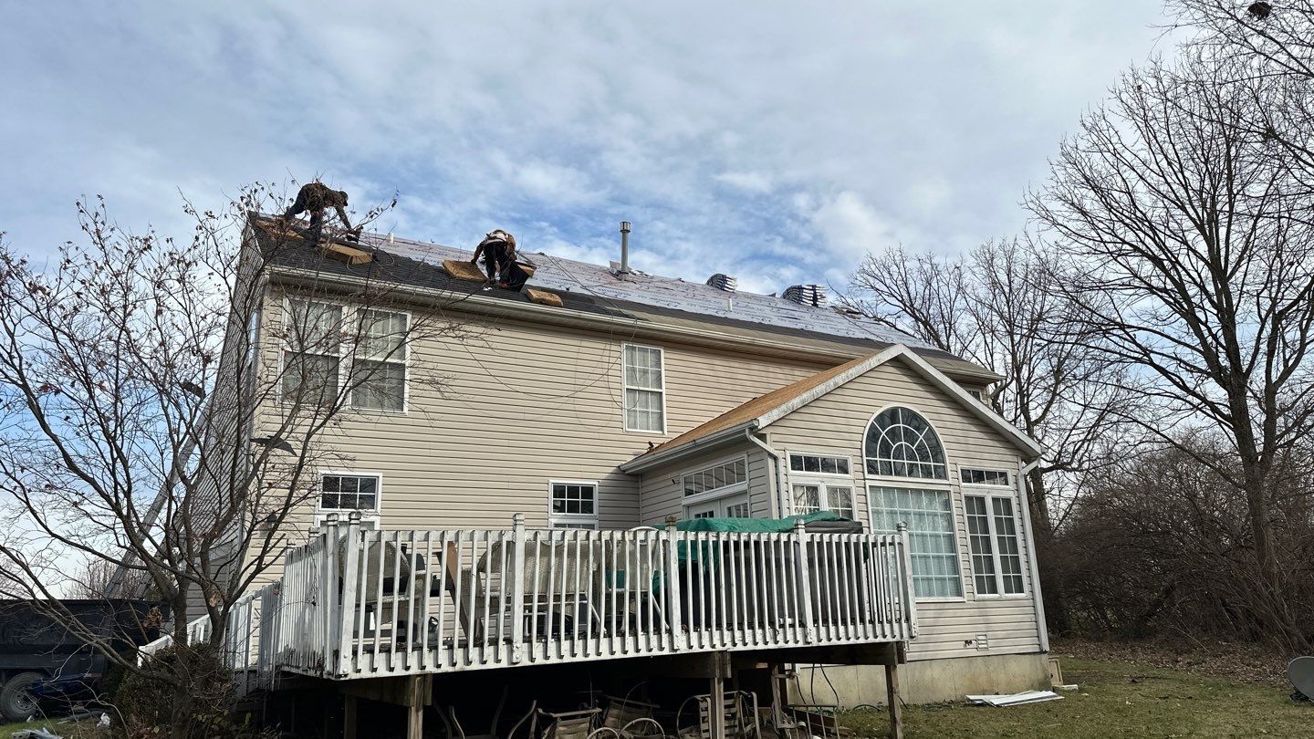 Walden Ponds - Pristine Black and Hydro Flo Gutter Guards by Tamlin Roofing
