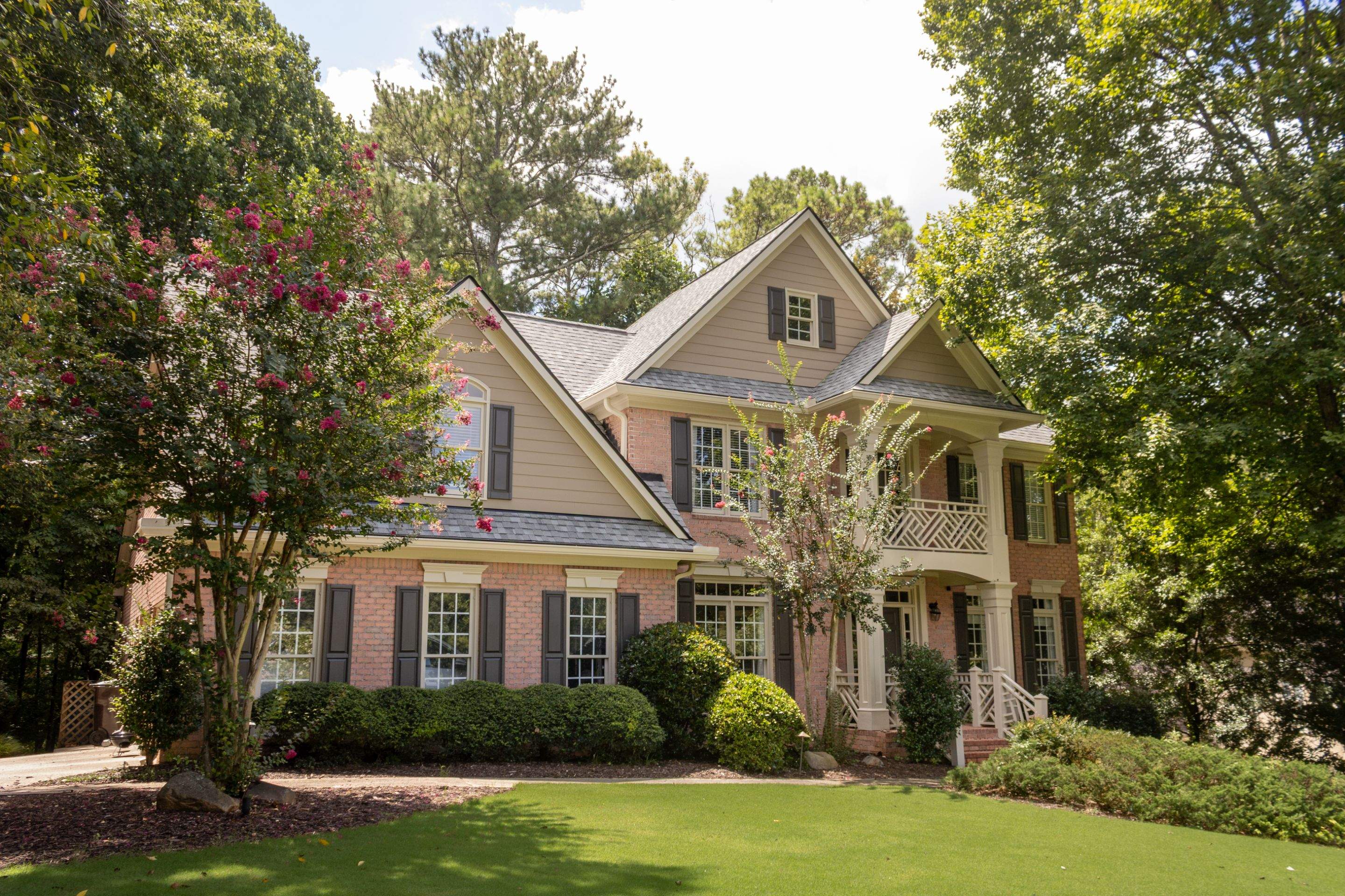 Full James Hardie Siding Replacement and Trex Deck Resurface in the Saddle Color by Nelson Exteriors 