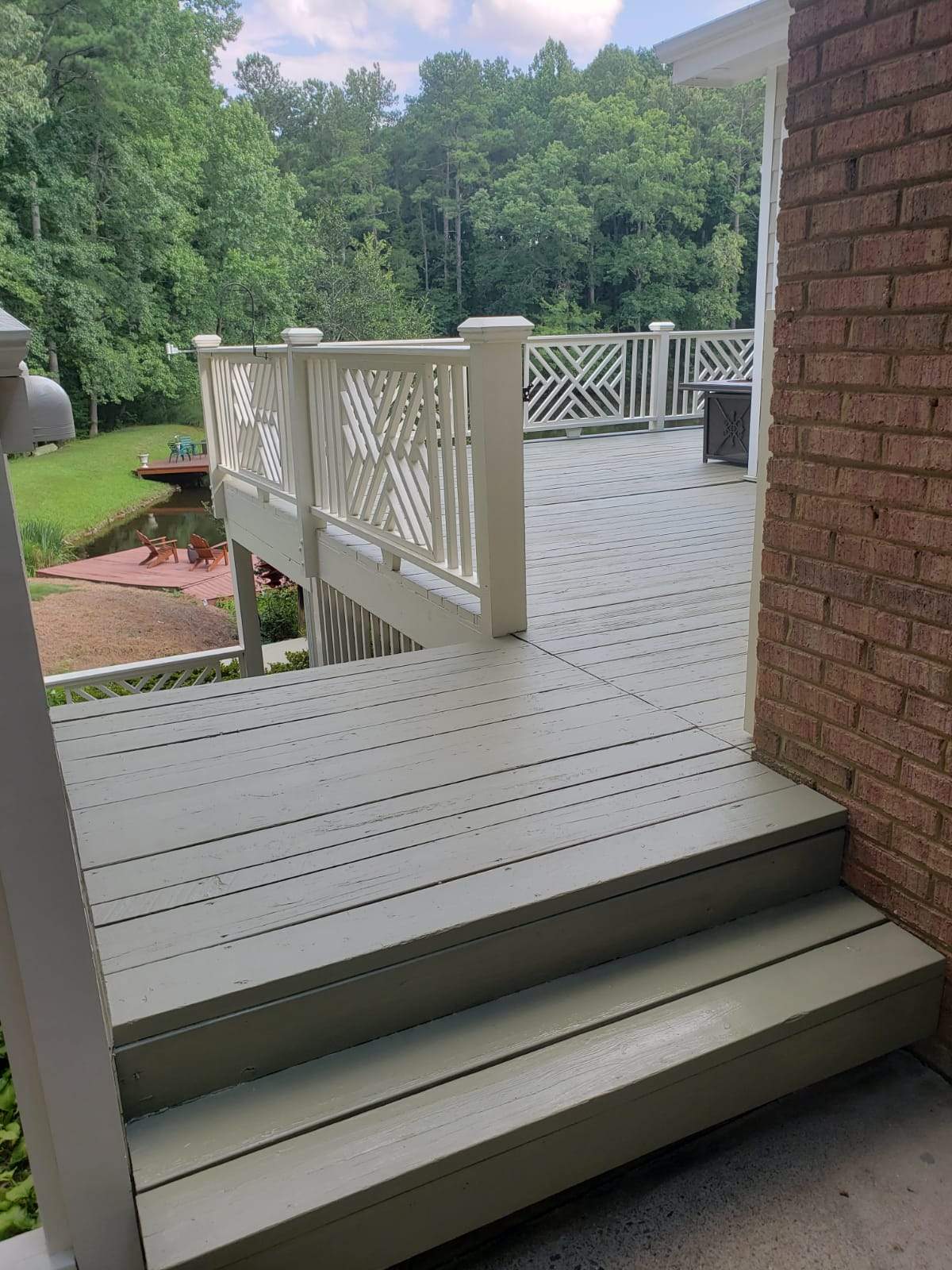 Roswell Deck Restoration Featuring Pressure-Treated Wood and Grey Finish by Swift Home Renovations 