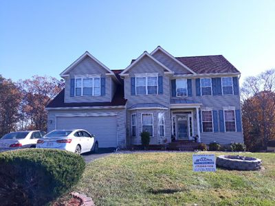 Woodbridge: CertainTeed Landmark Designer Shingles in Cottage Red