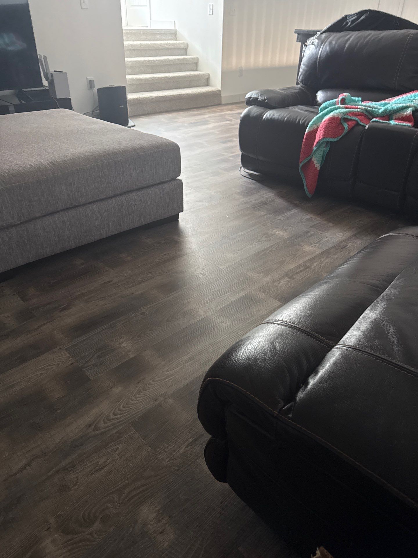 Living Room Interior Remodel with Wood-Look Plank Flooring in Scottsbluff by CompanyCam Sales Demo
