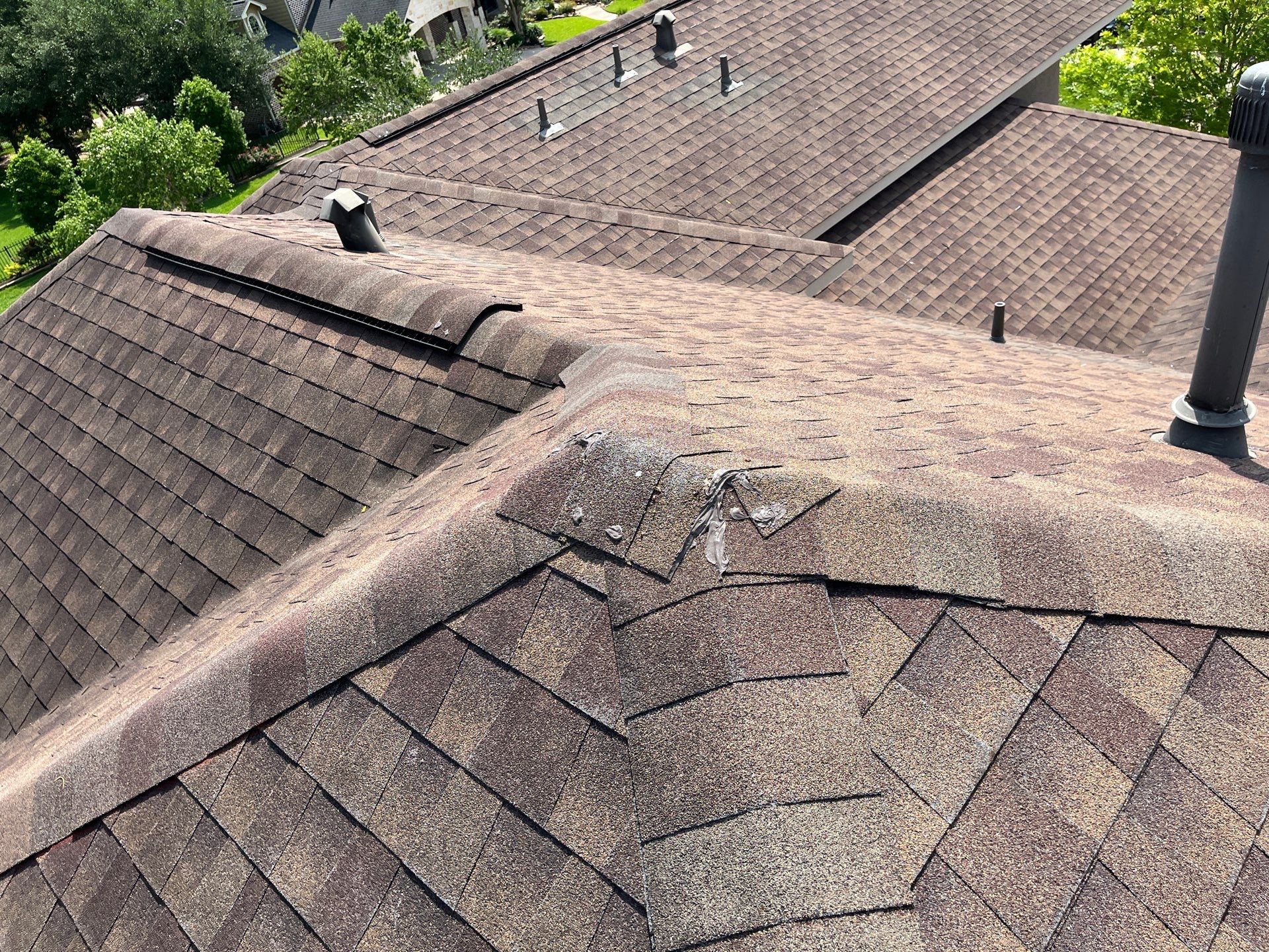 Hail Damage using Owen's Corning Duration (Lifetime) Shingles by Roof Repair Company