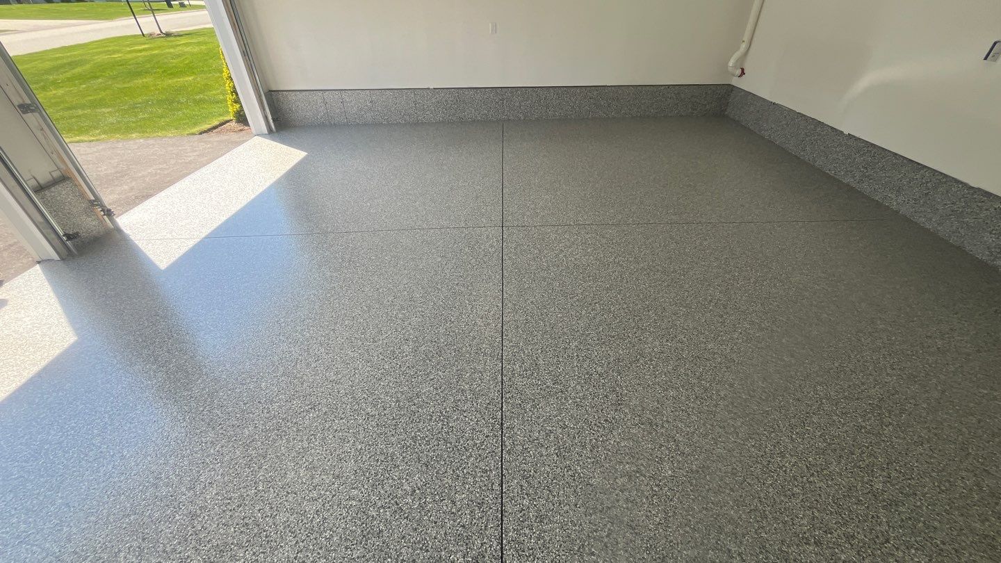 Garage in Londonderry, NH 03053 by Symphony Concrete Coatings