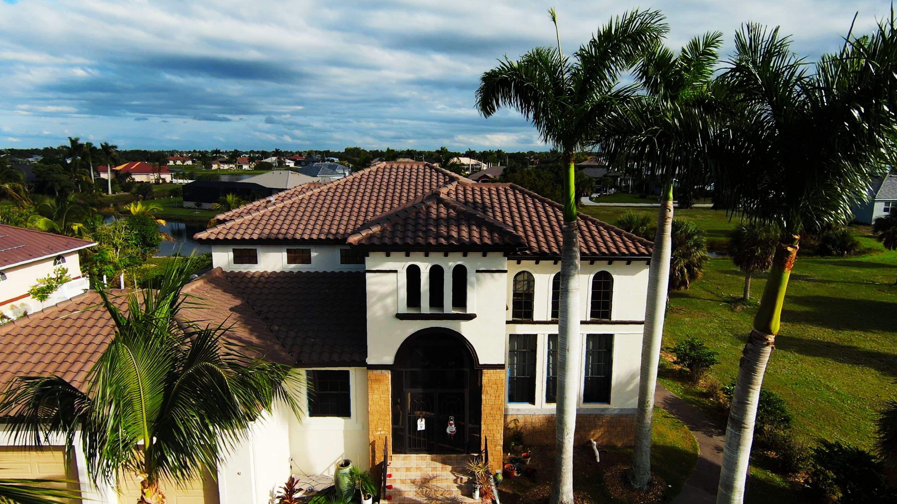 Punta Gorda Concrete Tile Roof Replacement by Four Peaks Roofing