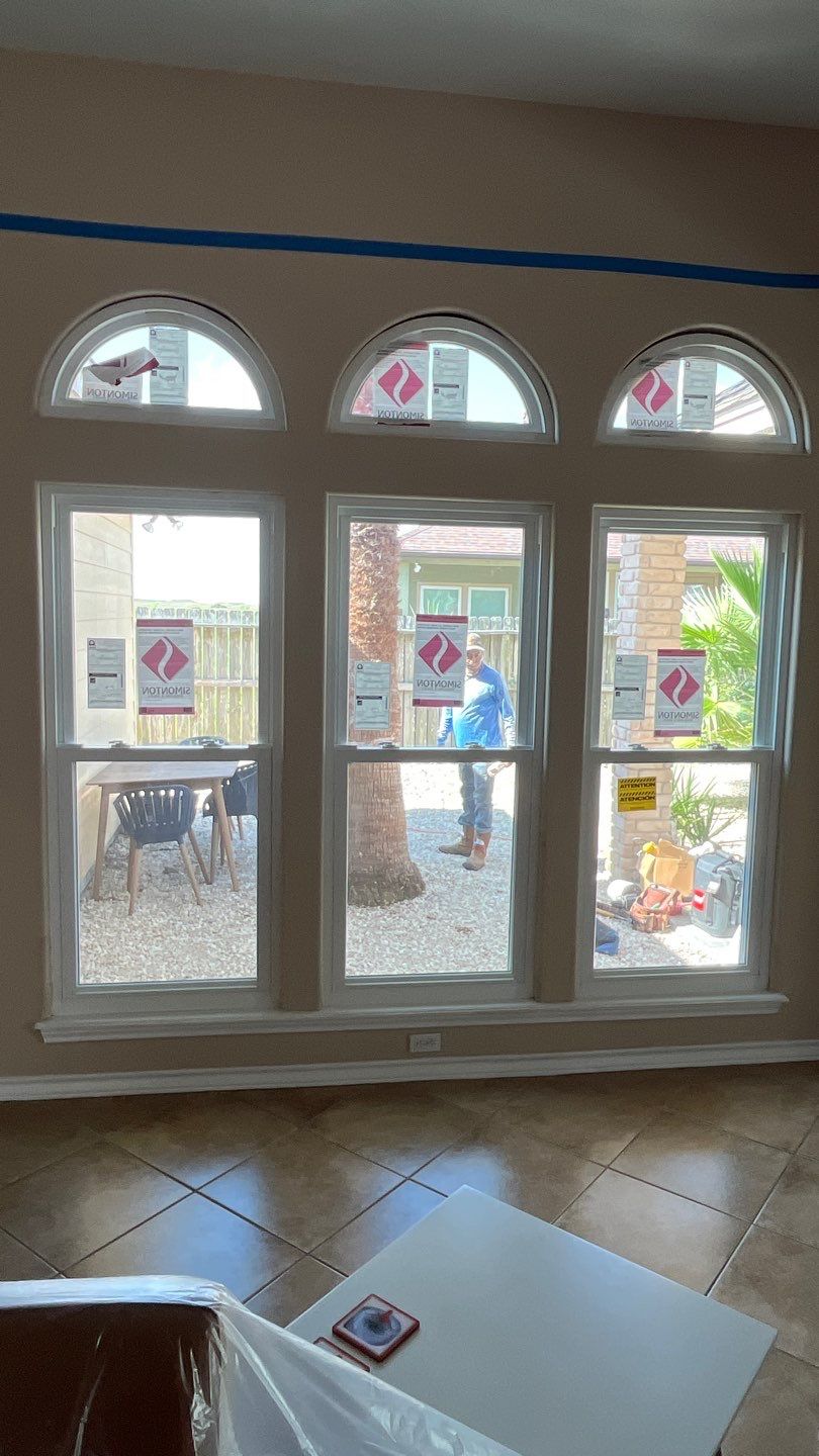 Curved Trim Windows by Bayfront Roofing and Construction