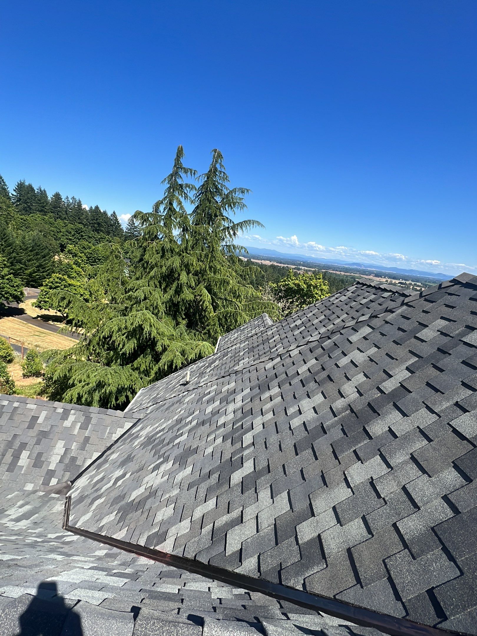 Residential Roofing Installation using Malarkey Windsor 50 Year Shingle (Color: Storm Grey) by Orezona Building & Roofing Company, Inc.
