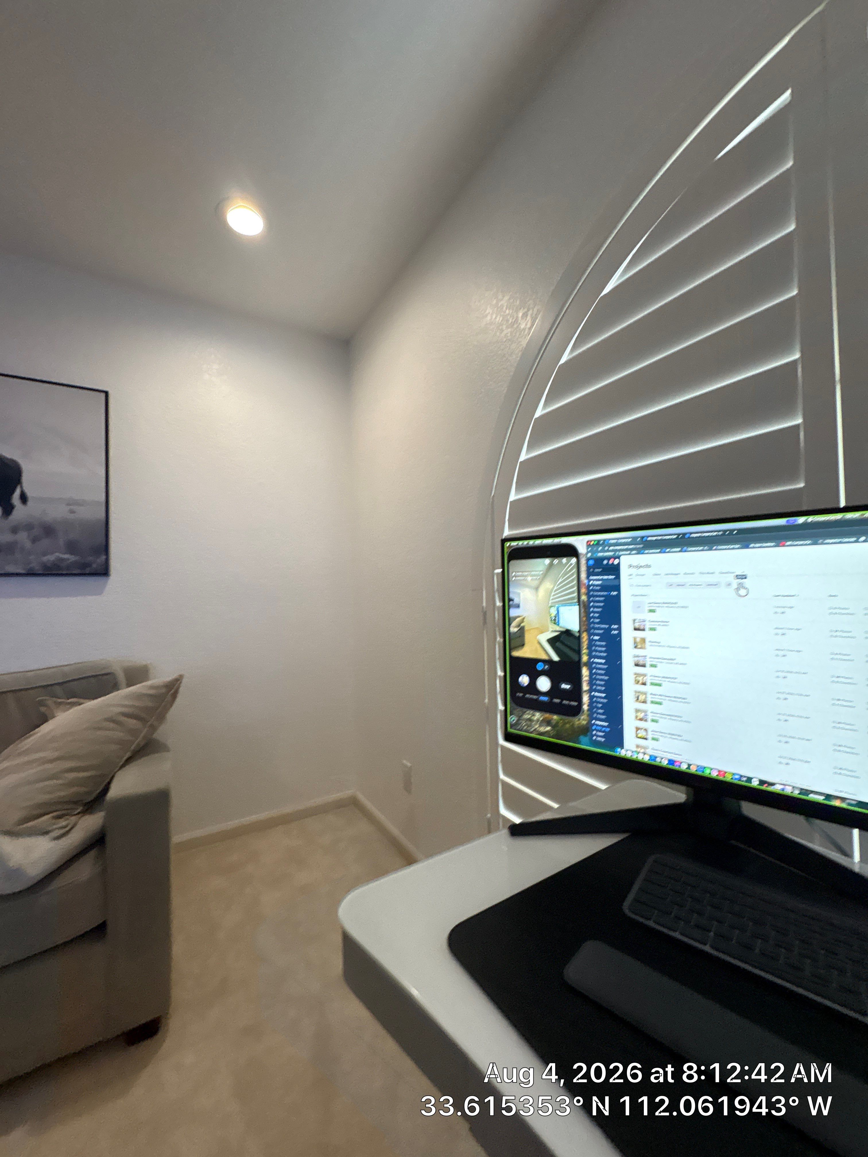 Phoenix Home Office Setup with Custom Arched Plantation Shutters by CompanyCam Sales Demo