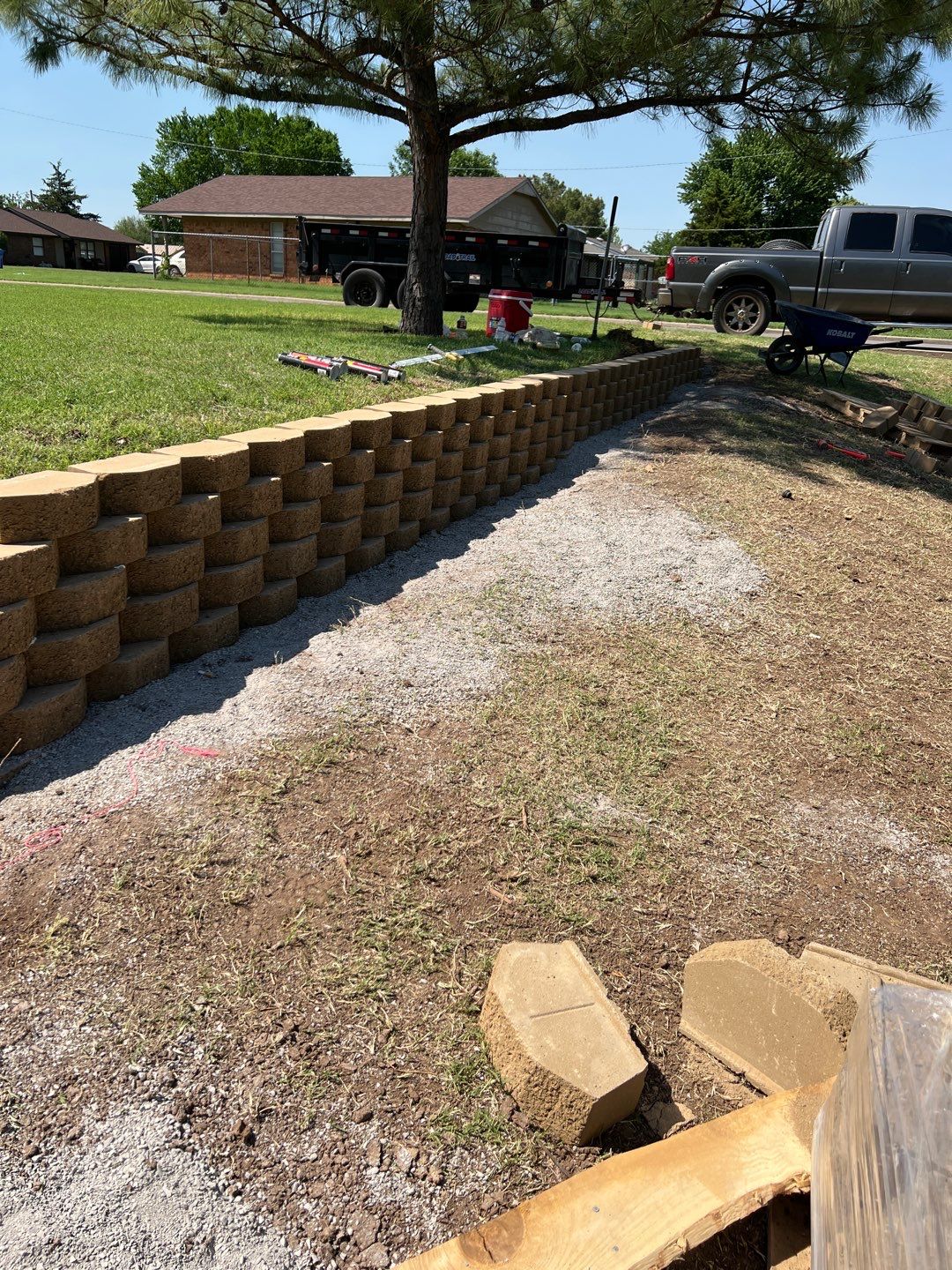 Retaining Wall using Rocks by Clays Services Inc