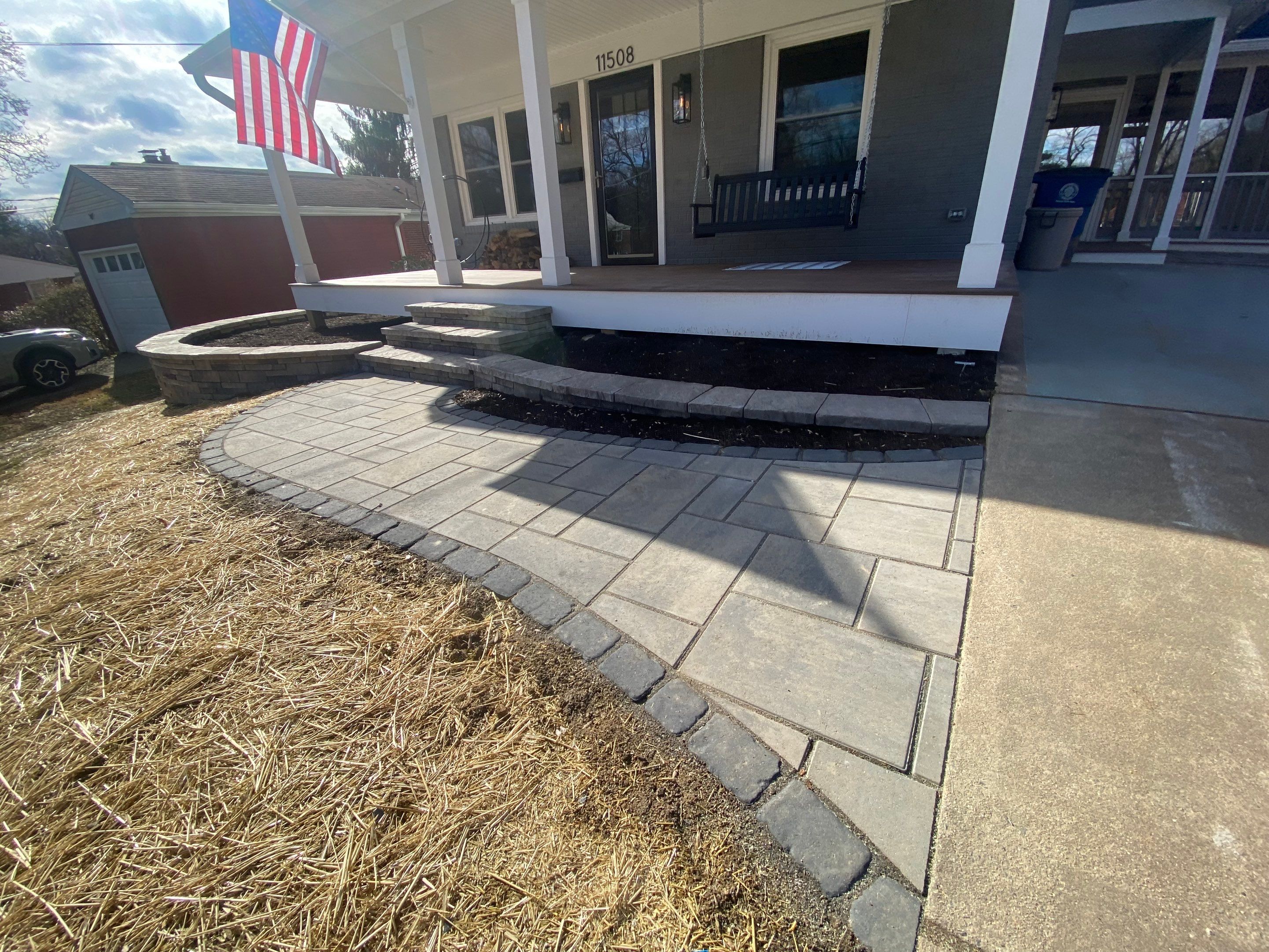 Retaining wall, walkway, small patio and landscape install by The Smet Companies, LLC