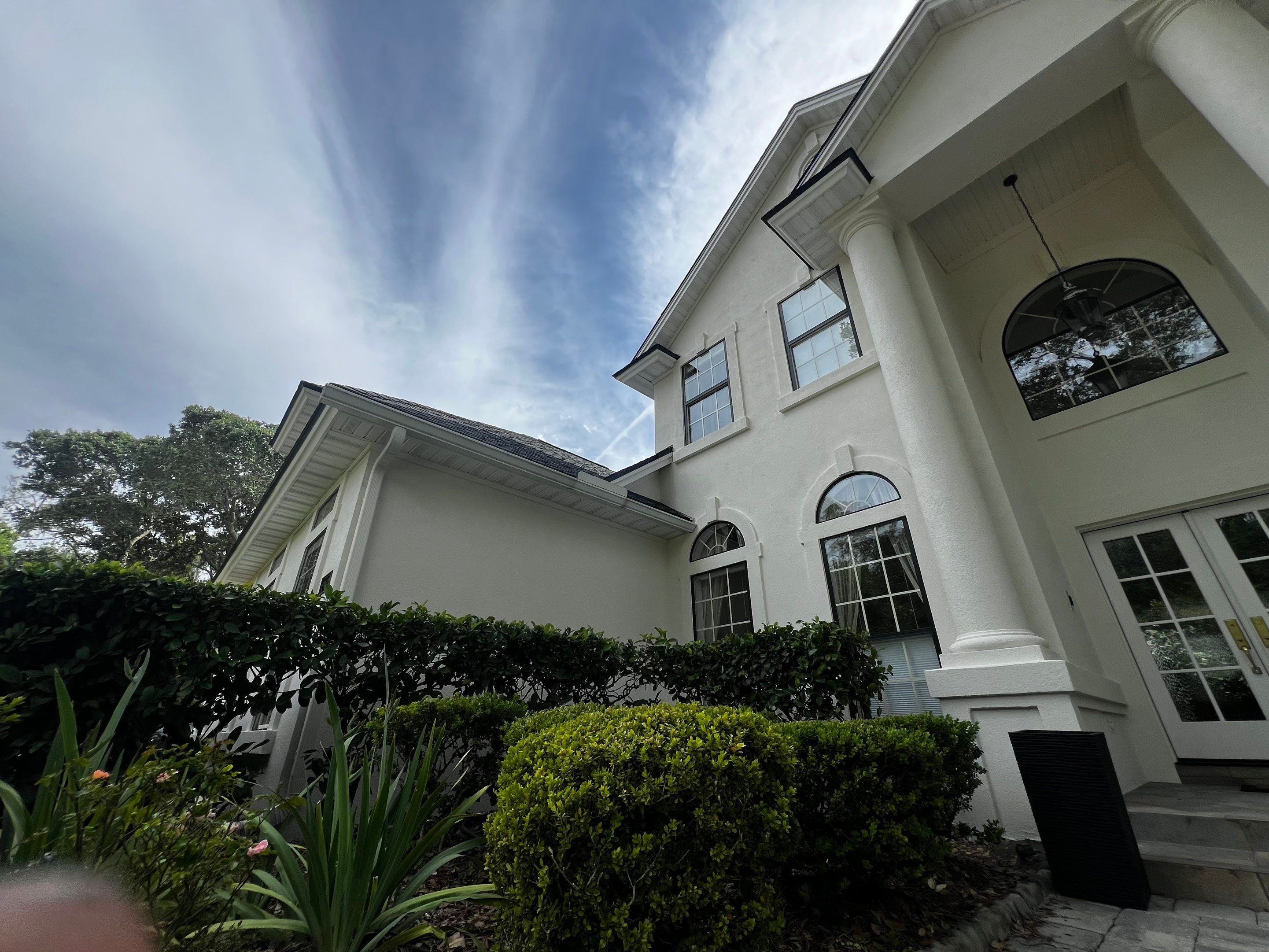 Large Stucco Home Exterior Painting in Marsh Landing | Ponte Vedra Beach, FL by A New Leaf Painting, LLC