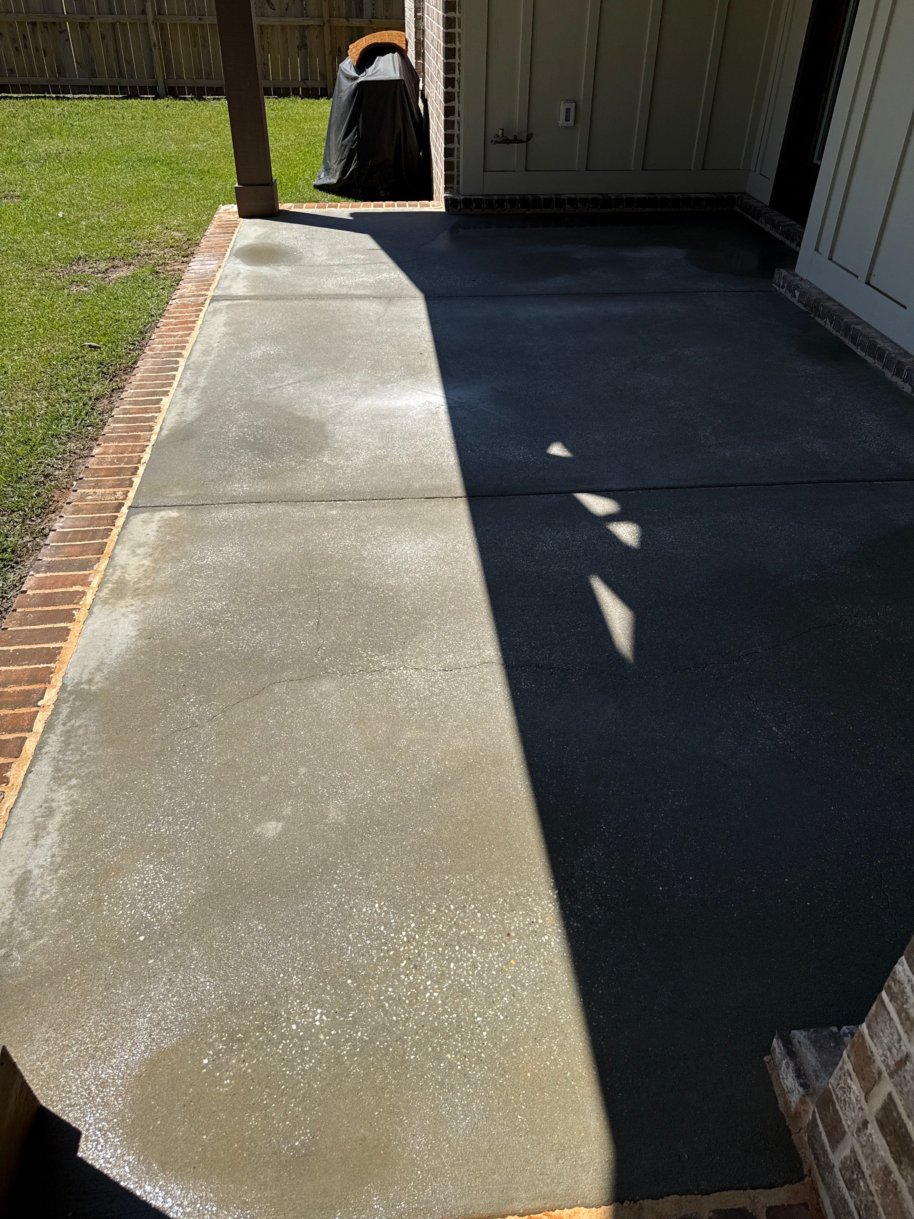 Decorative Stained Concrete Overlay and Garage Floor Coating in Mobile by Cornerstone Hard Surface Restoration 