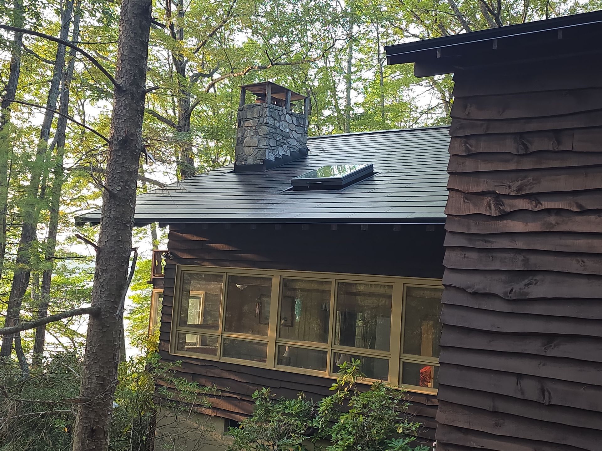 Stunning Tesla Solar Roof Cabin in the Woods by American Home Contractors
