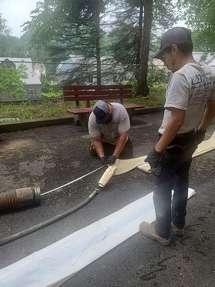 Sewer Repair using Perma-Liner through two manholes by Sureway Comfort John Wilcox Plumbing Heating Cooling