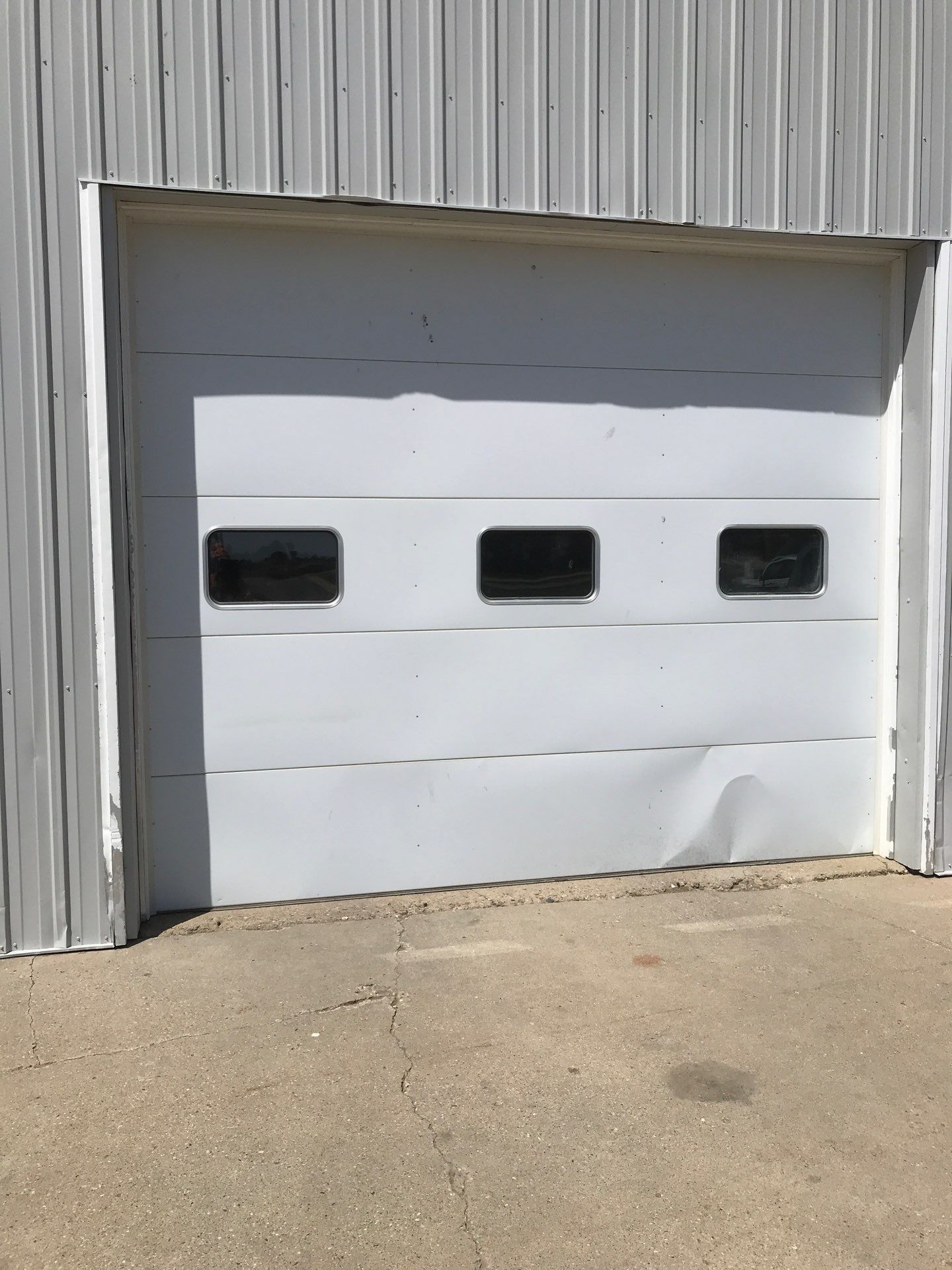 Commercial Shop Renovation and Concrete Parking Installation in Brookings by Select Painting, Coatings & Garage Cabinets