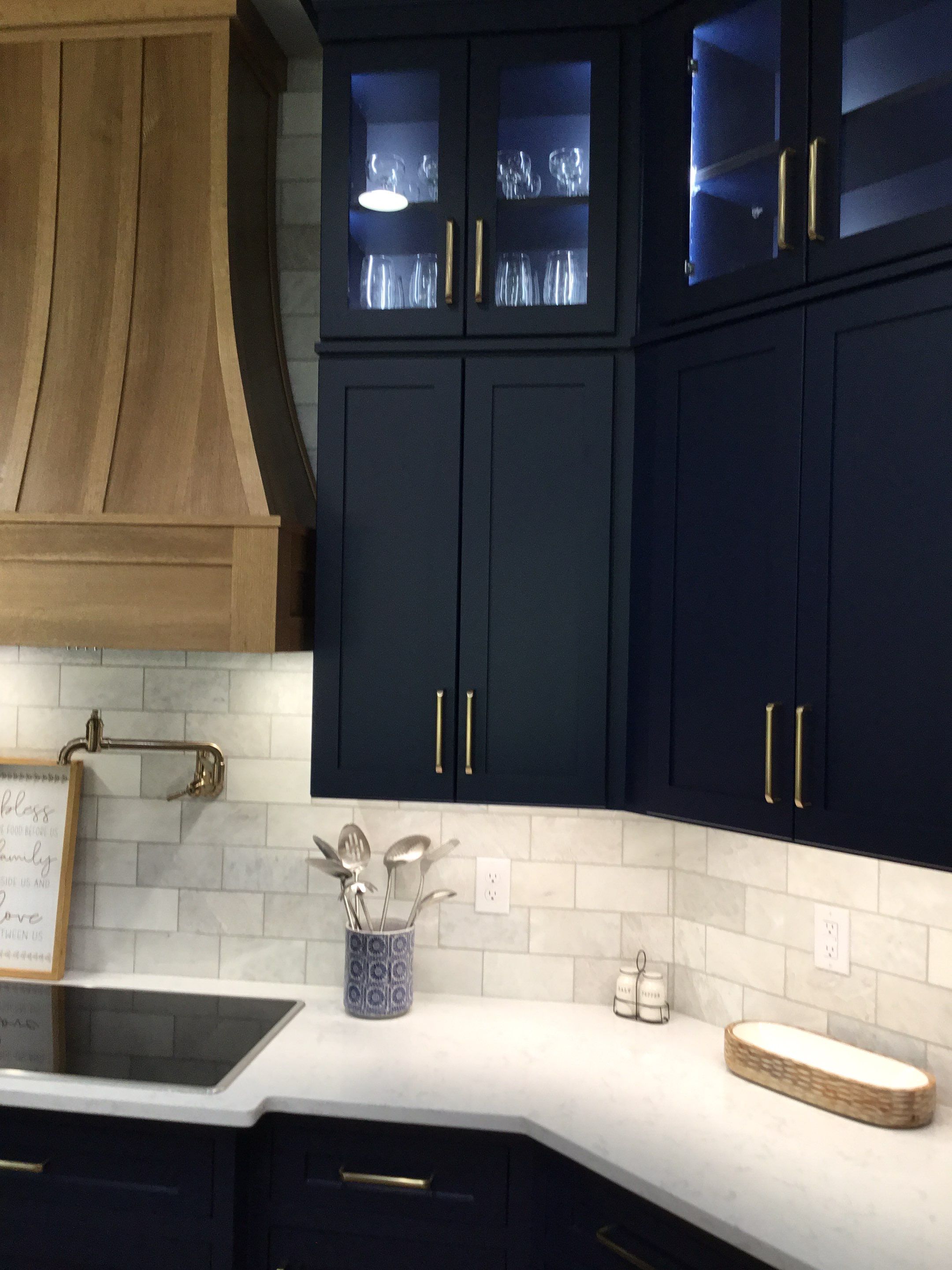 Spring Branch Kitchen Remodel | Custom Navy Cabinetry & Wood Range Hood by Legacy Bath and Kitchen