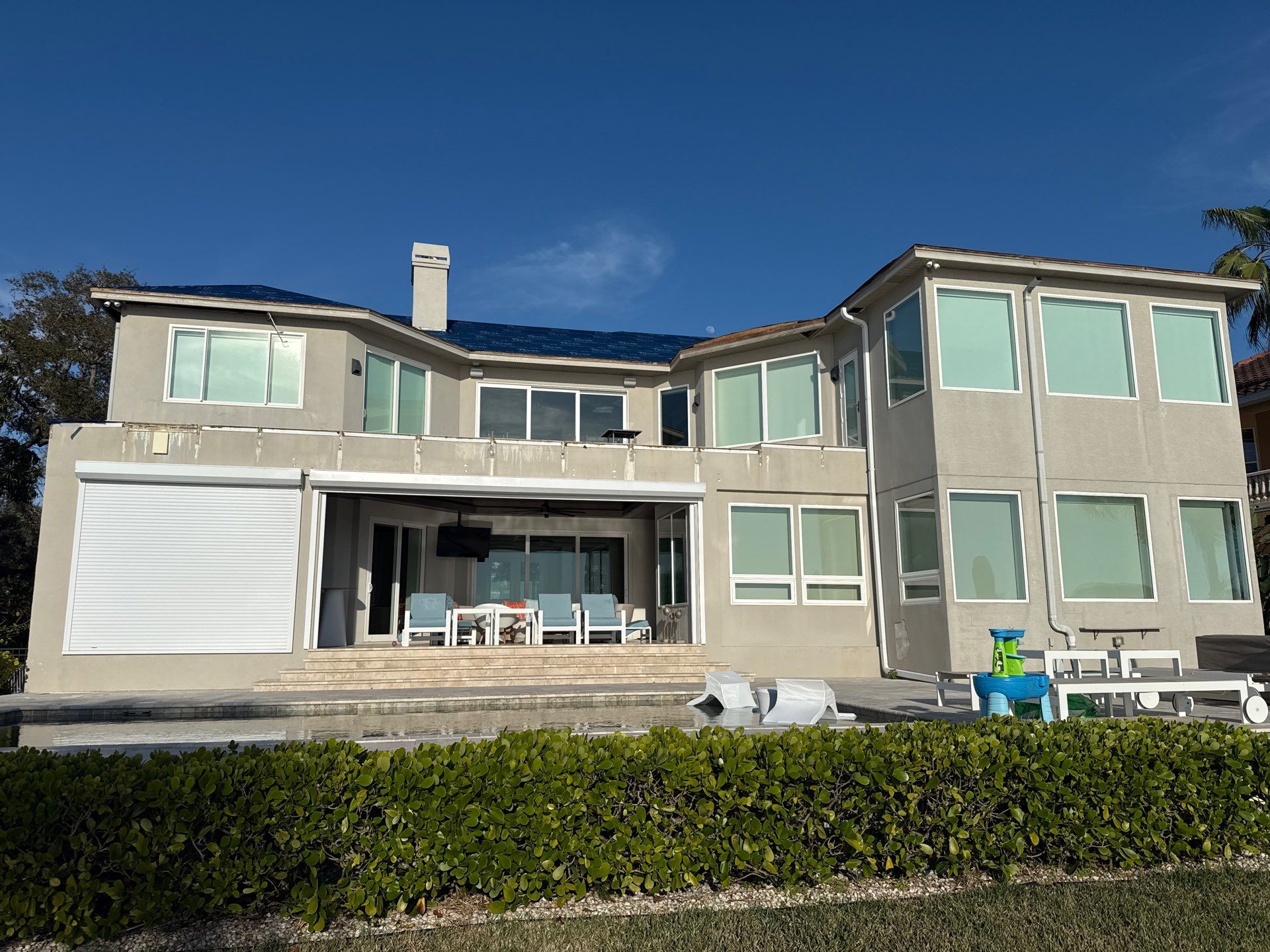 Soffit and Fascia Installation and black seamless gutters in Sarasota FL by Gutter Professors