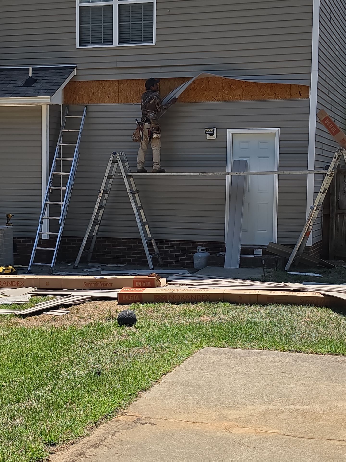Vinyl Siding and Trim Replacement for Two-Story Sanford Home by The Remodeling Company