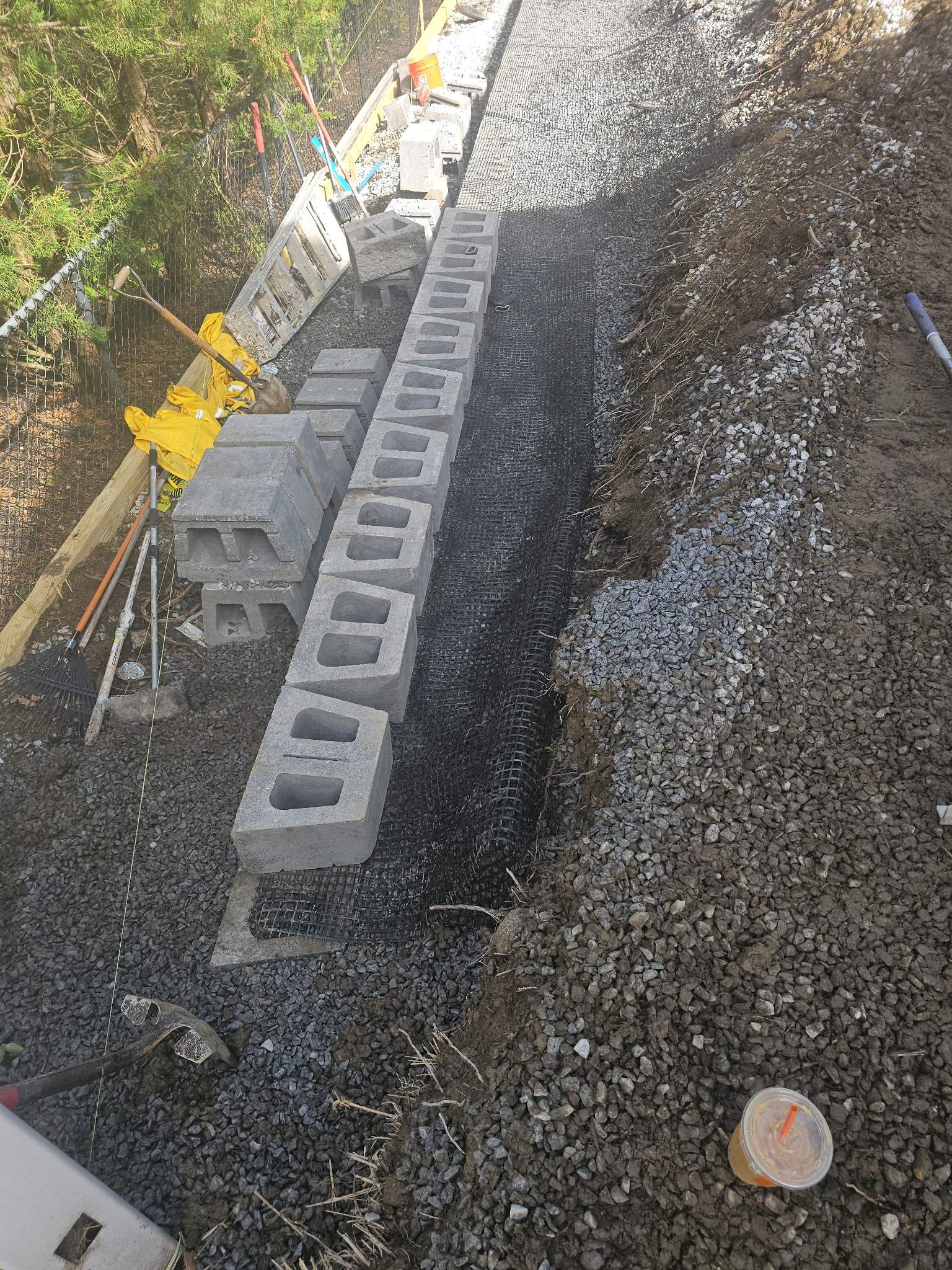 Retaining Wall to Level Backyard  by May Property Management 