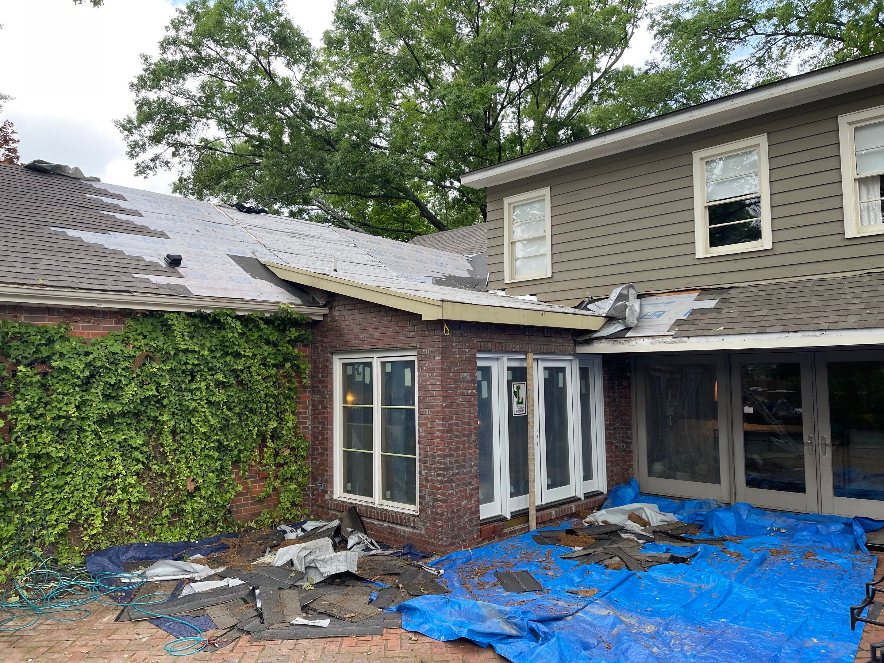 Architectural Shingle Roof Replacement with New Skylights in Memphis by Revival Roofing Services