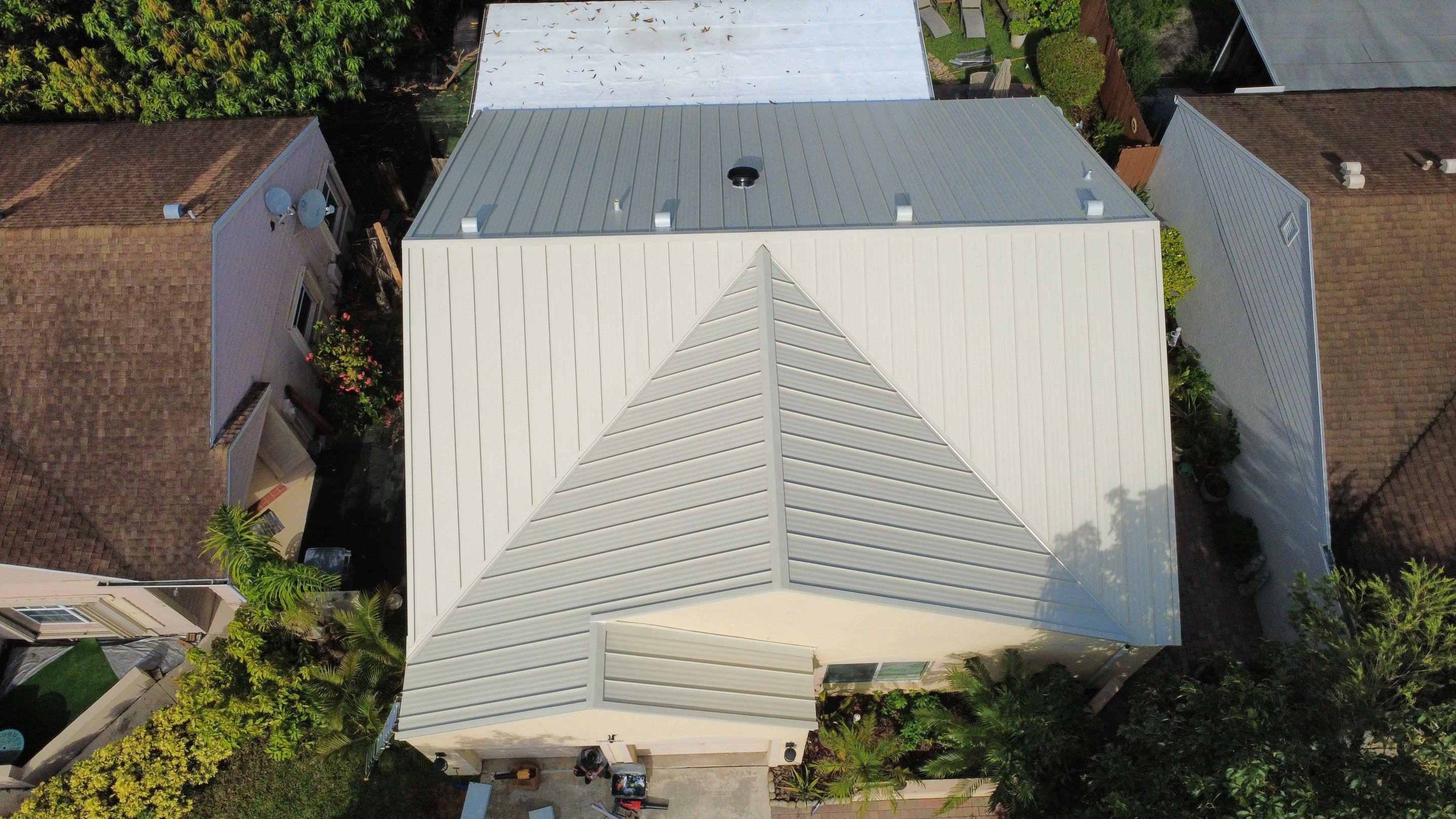 Residential Roofing Installation using 1.5'' Mechanical Seam by BLUES BROTHERS ROOFING