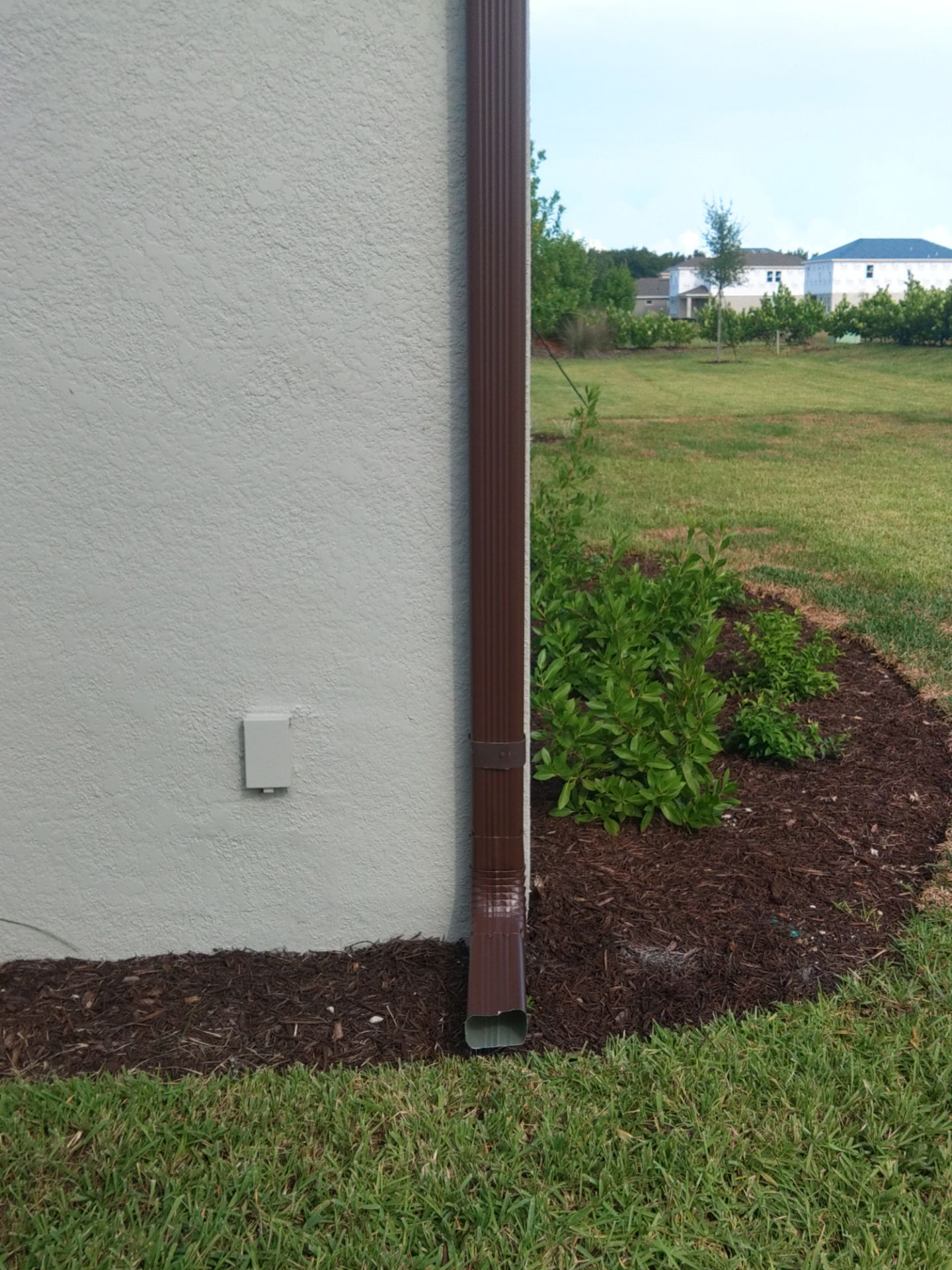 Musket Brown Seamless Gutters using Musket Brown Seamless Gutters in Nokomis FL by Gutter Professors