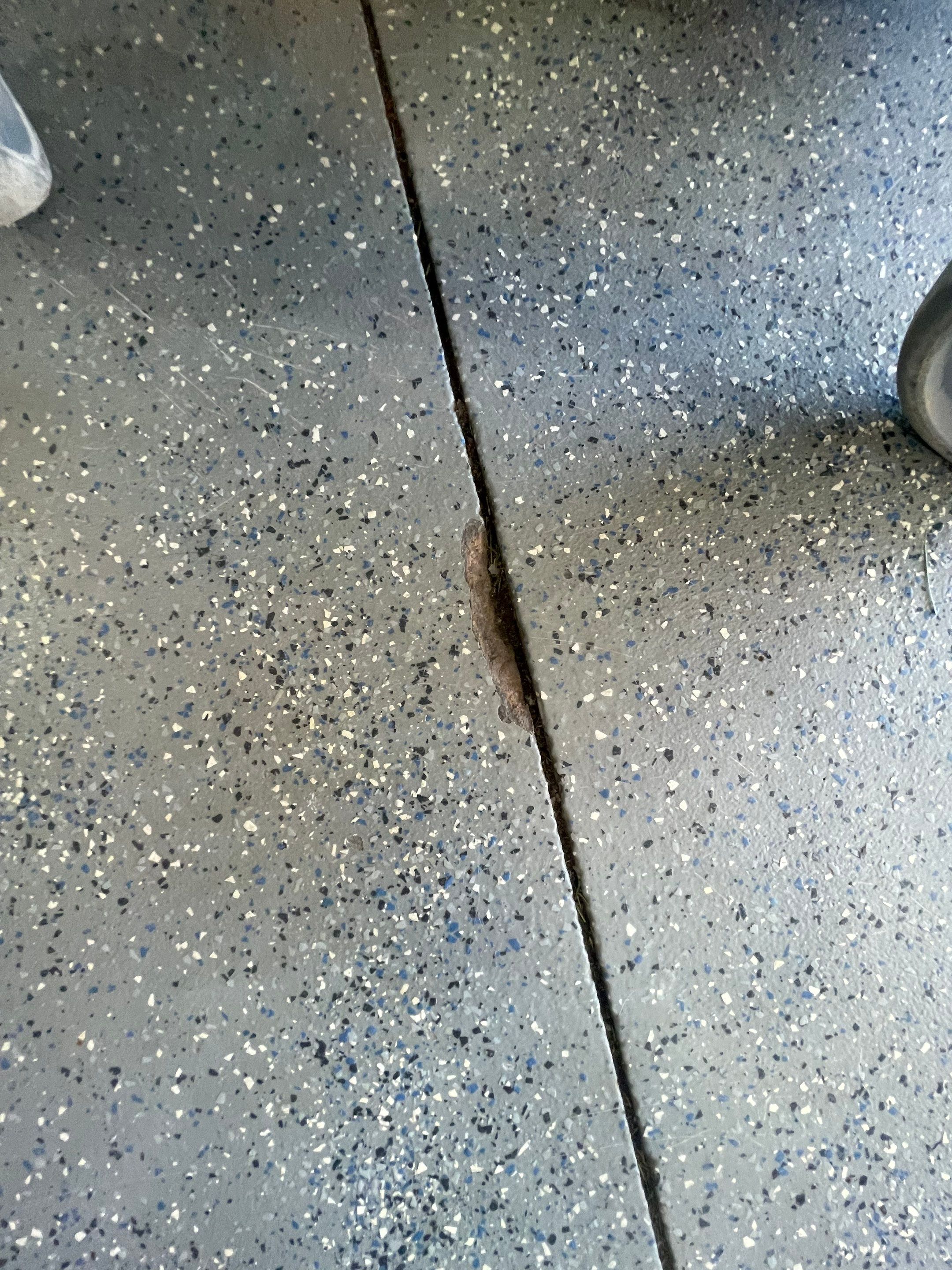 Residential Garage Floor Coating in Sioux Falls by Select Painting, Coatings & Garage Cabinets