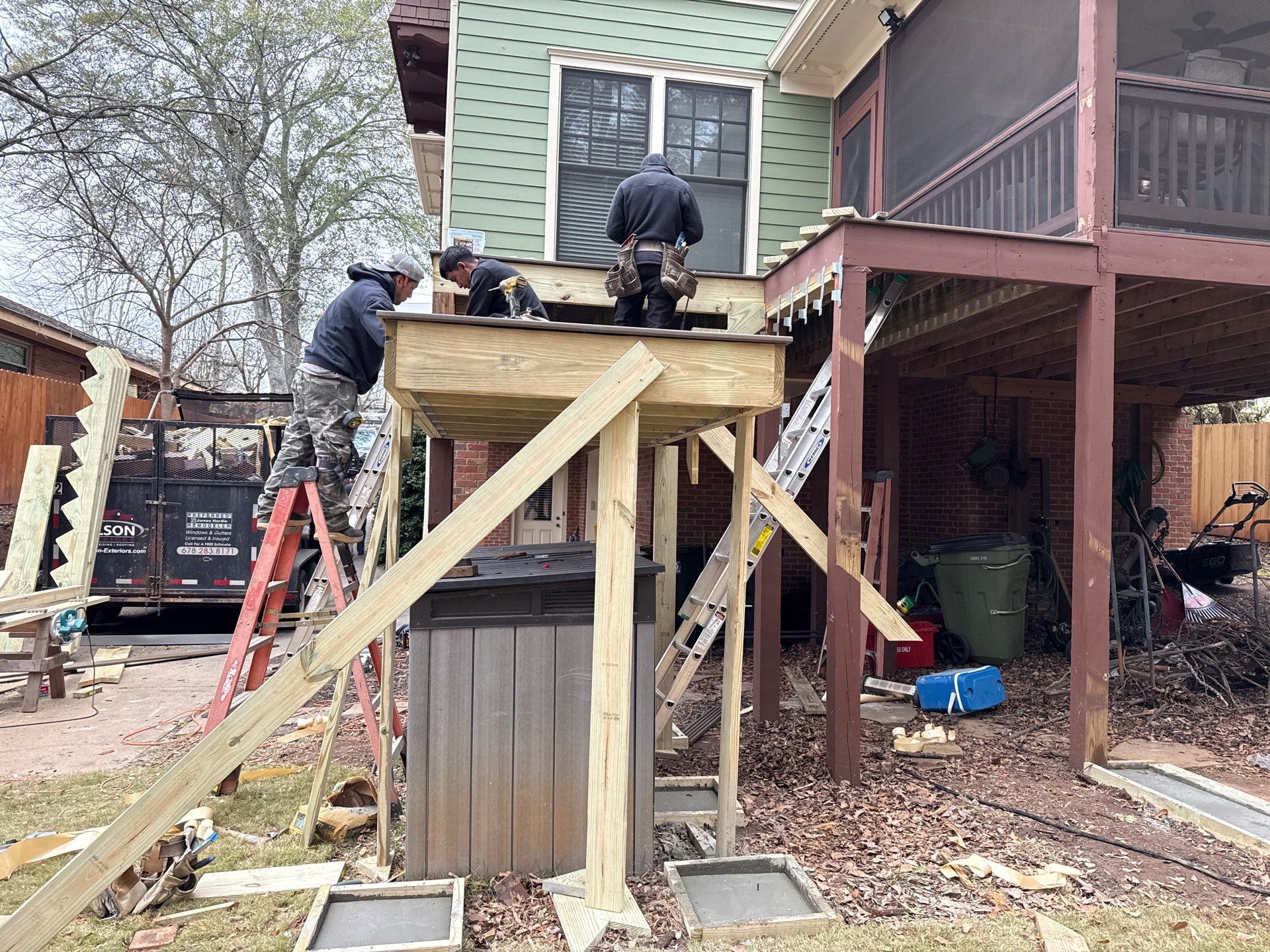 Deck Resurface using Trex and Deckorators ALX Contemporary railing by Nelson Exteriors 