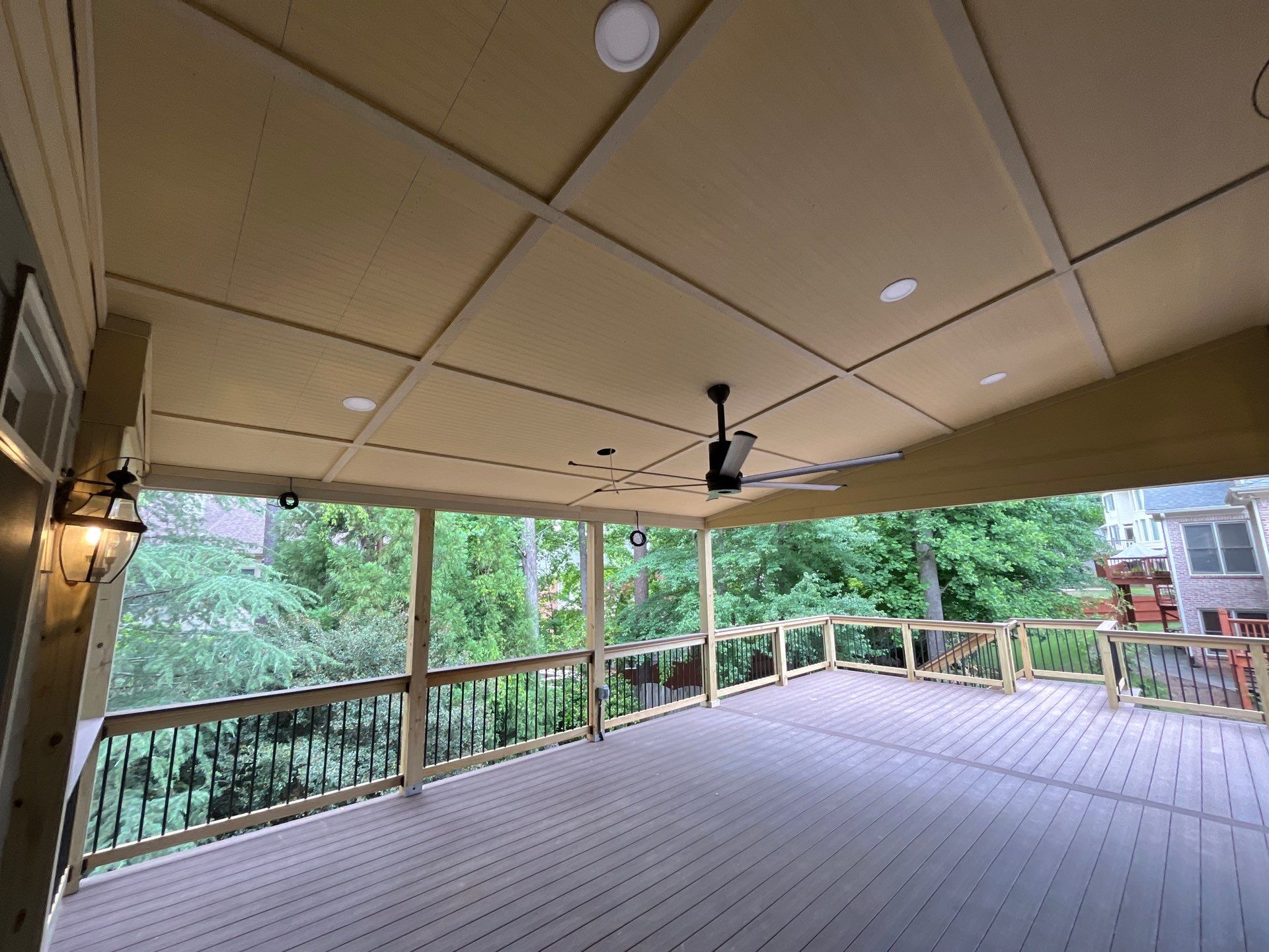 Tucker, GA Covered Porch Build and Deck Replacement using Deckorators Voyage Series Decking by Nelson Exteriors 