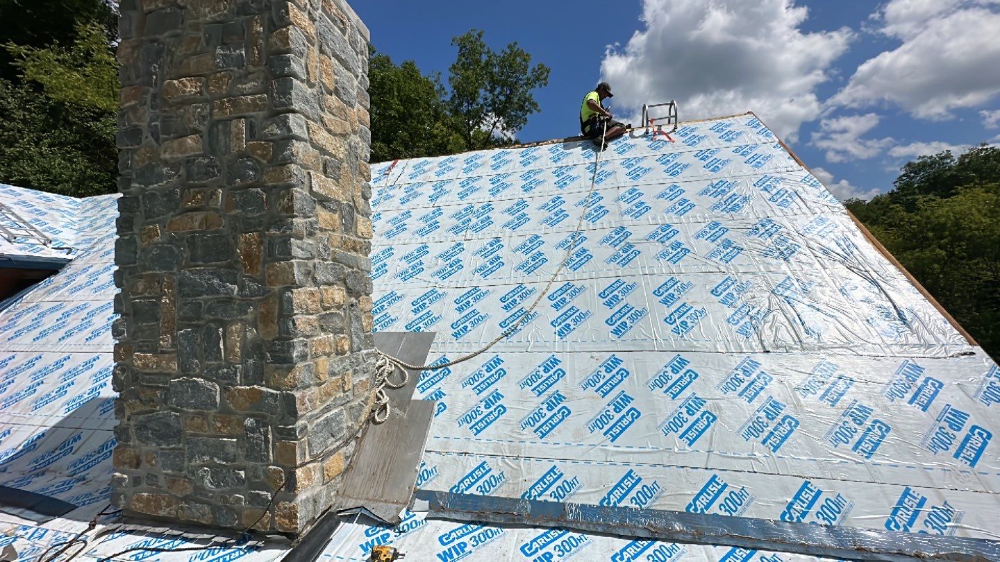 Residential Roofing Installation using Standing Seam Metal - Gallery Blue by RoofX 