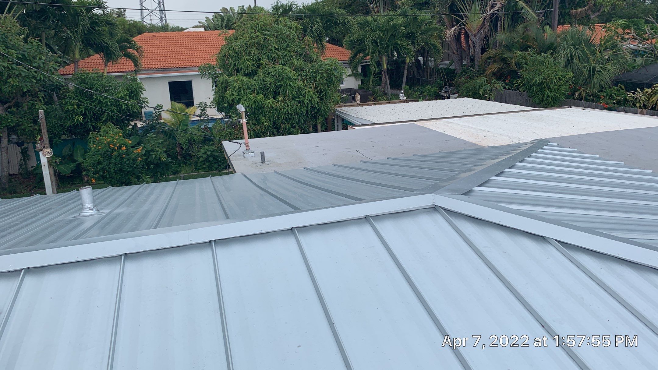 Residential Roofing Installation using 1" Nail strip metal roof by BLUES BROTHERS CONSTRUCTION CORP