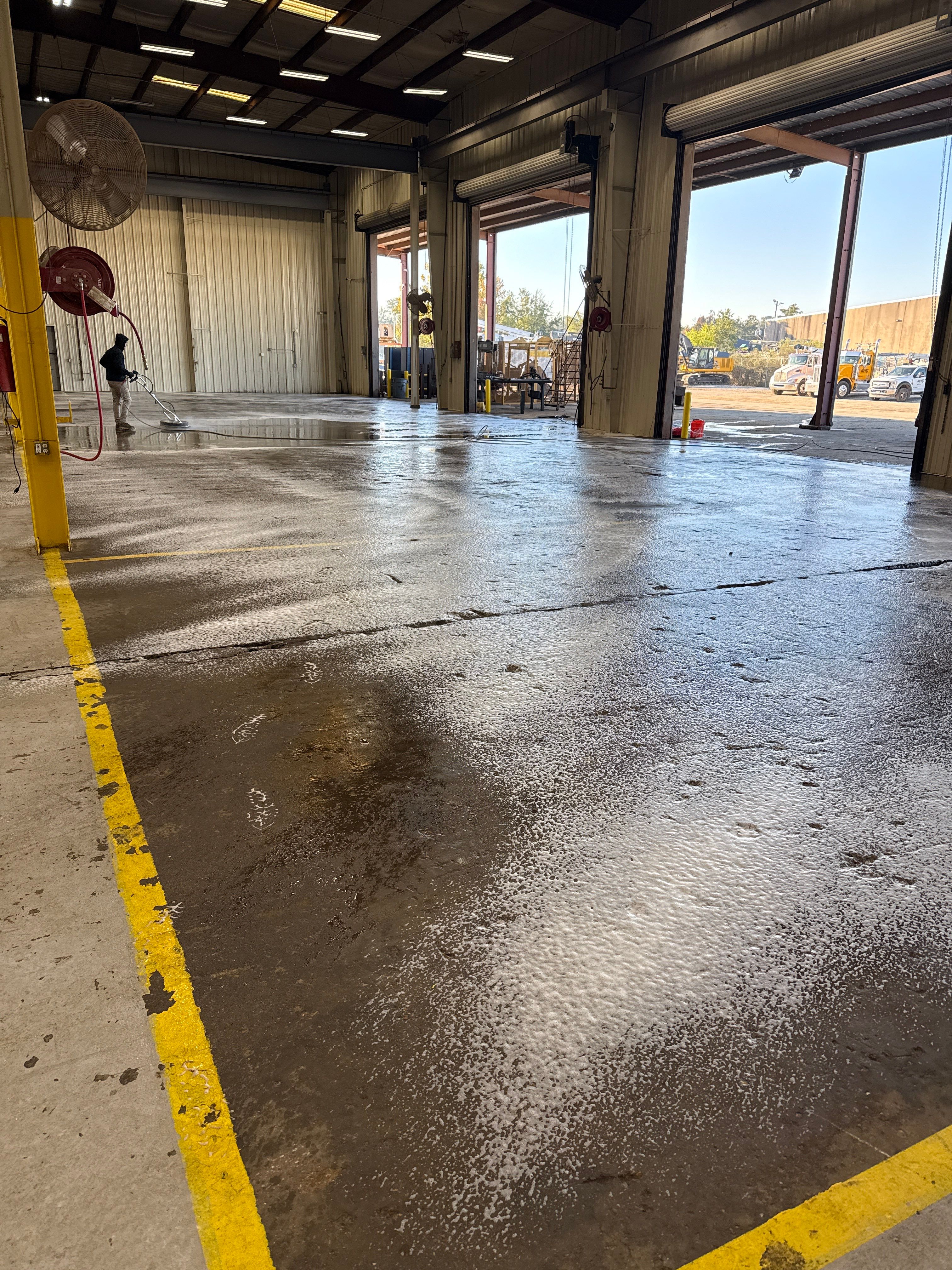 Industrial Epoxy Flooring for Heavy Equipment Work Bay in Mobile by Cornerstone Hard Surface Restoration
