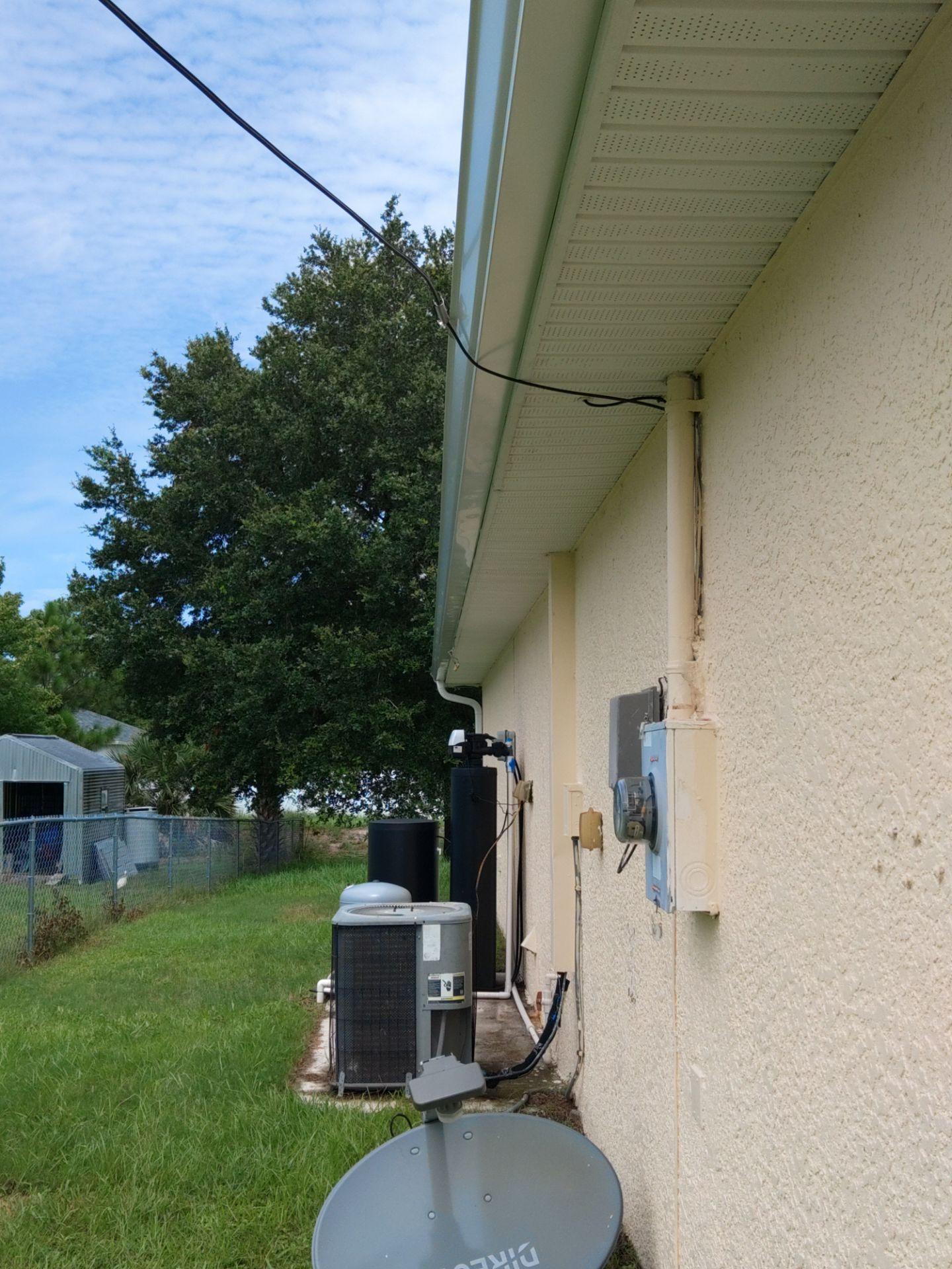 Seamless gutters in Lehigh Acres, FL provide a strong and efficient solution for managing heavy Florida rainfall by Gutter Professors