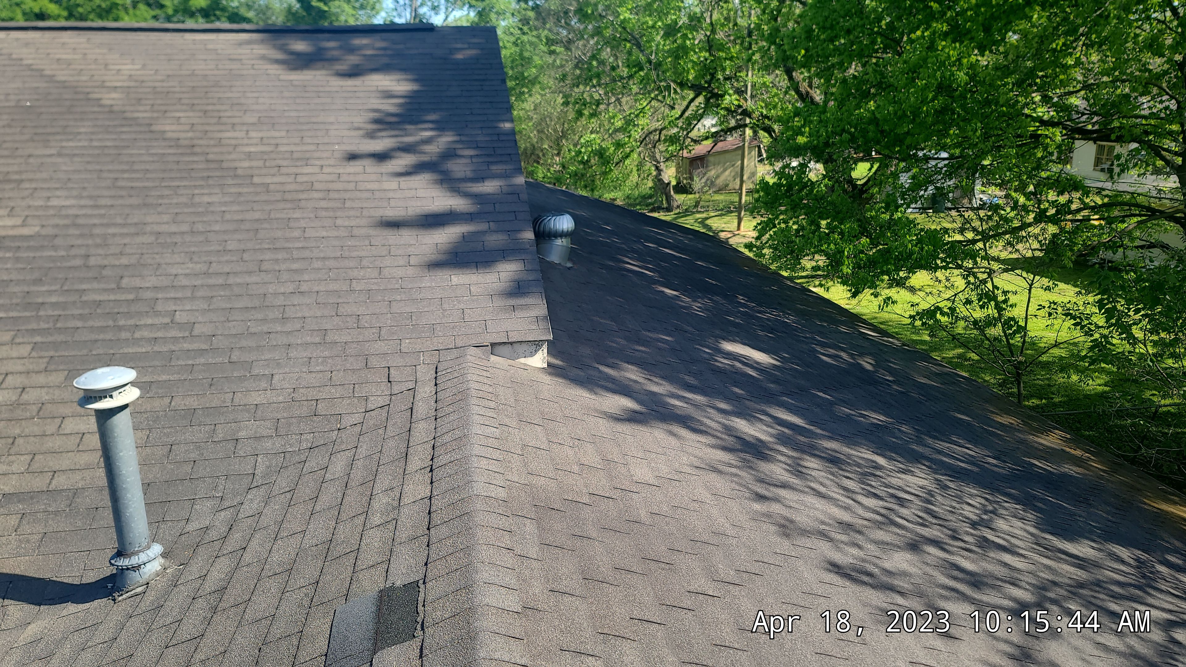 Storm Restoration Reroof: 25 Year 3-Tab Shingle by Hostetler Roofing