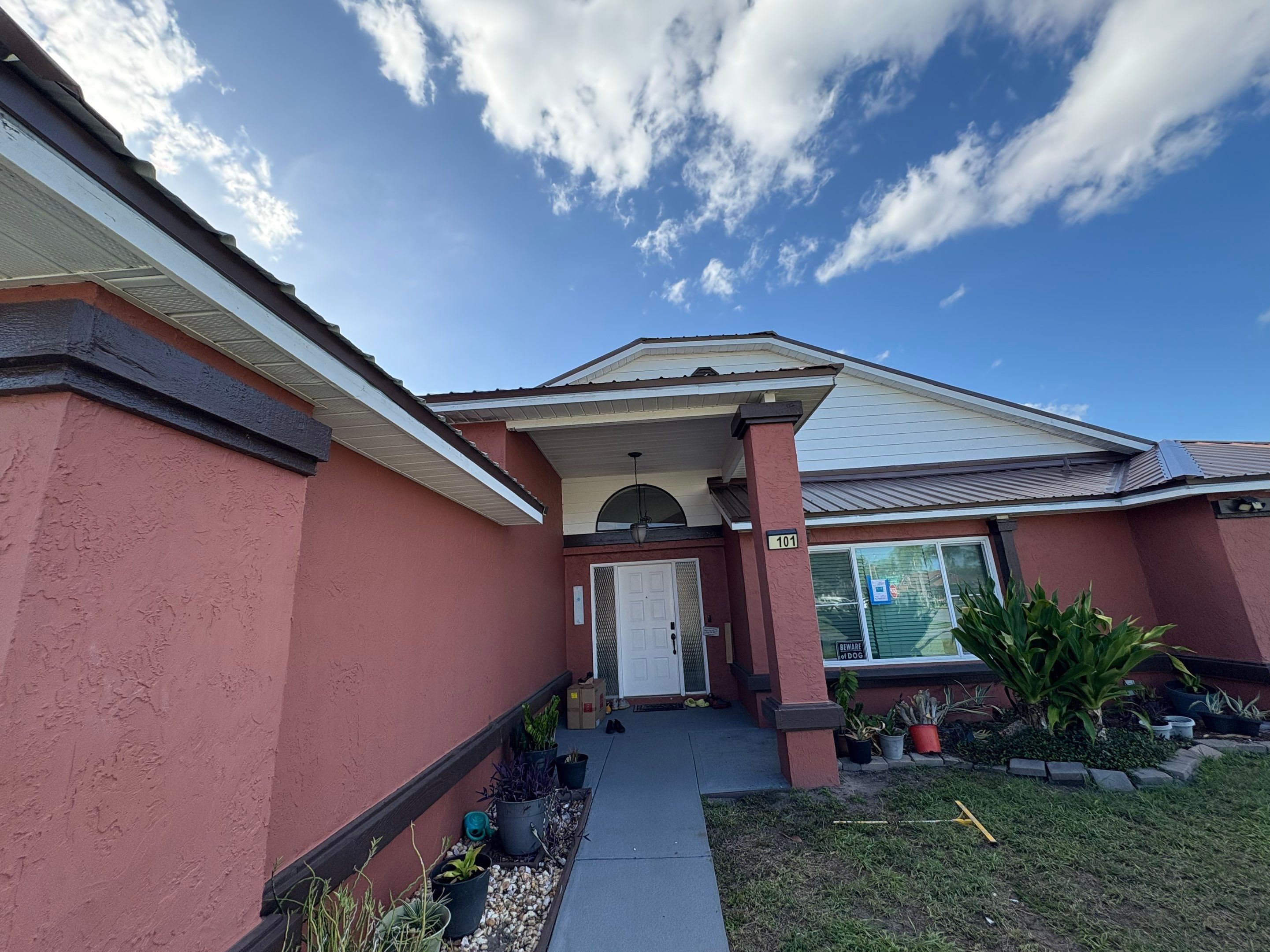 Residential Metal Roofing Installation and Gutter Replacement in Kissimmee by Pinnacle Roofing Group