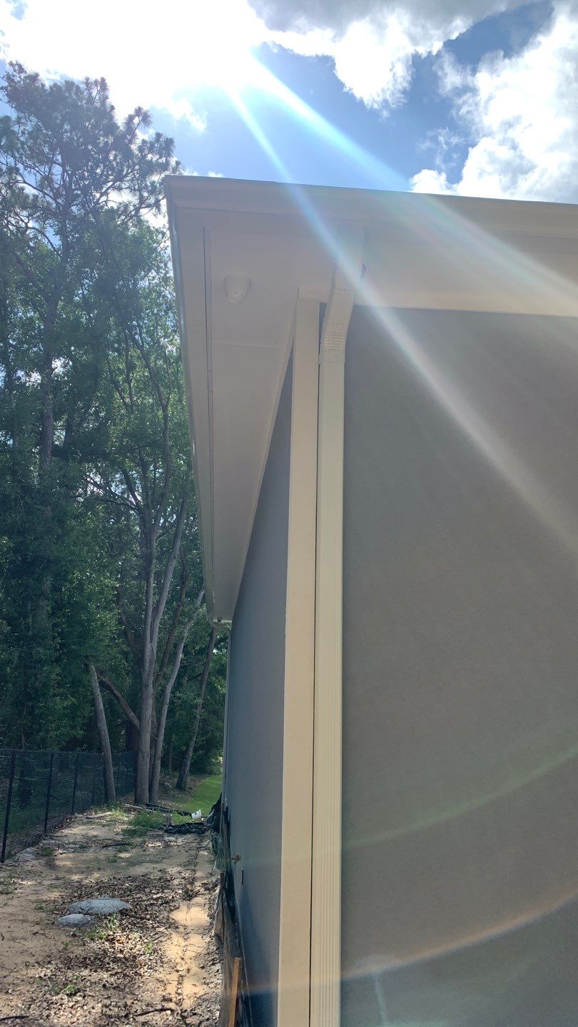 Seamless Aluminum Gutter Installation using 6 Inch Seamless Gutters in MIlton FL by Gutter Professors