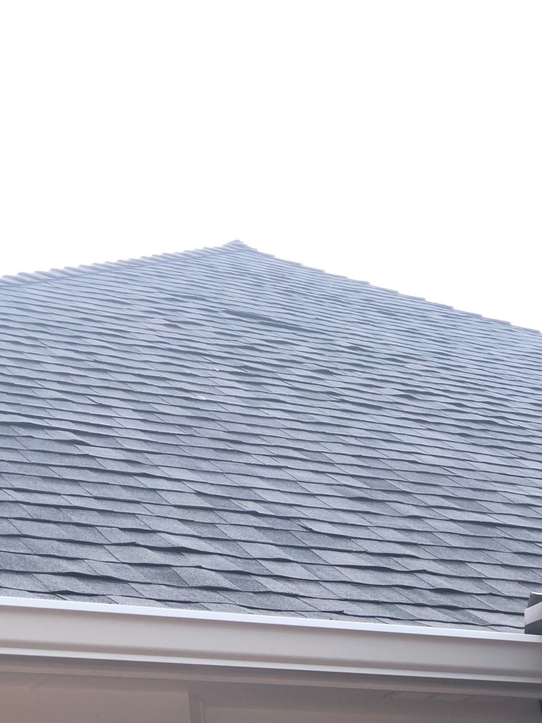 Certainteed Landmark Moire Black Roof project by Springtree Restoration 