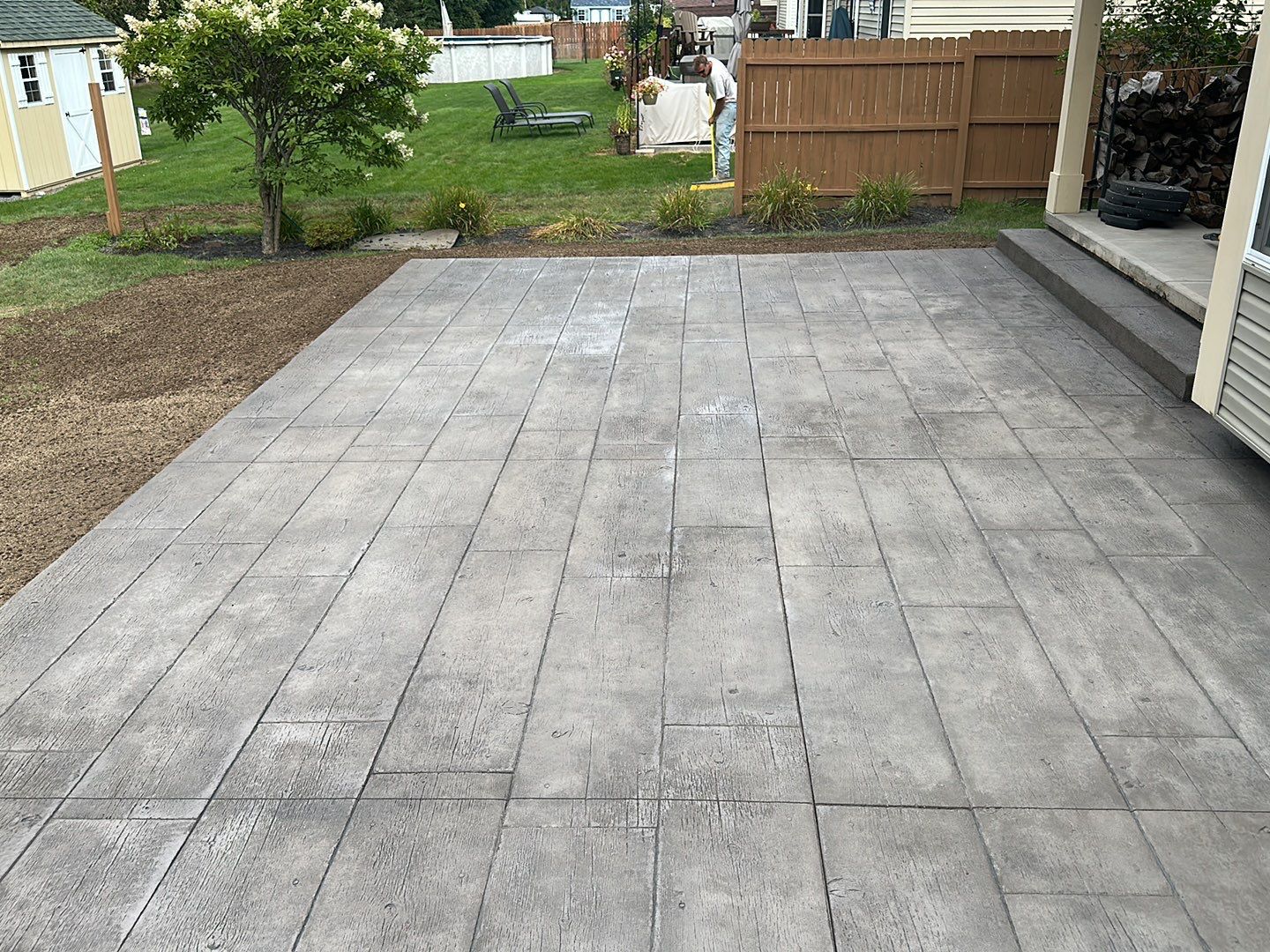 Wood Plank Stamped Concrete Patio  by NG Masonry & Construction LLC