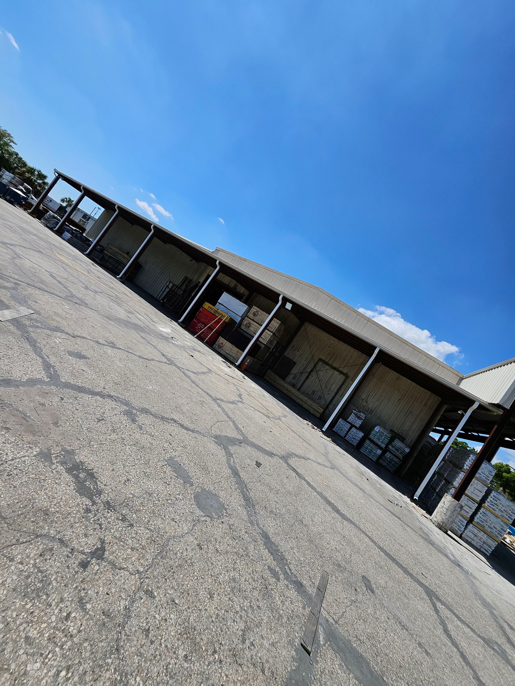 Commercial Box Gutters and White Downspouts Installation in Tampa FL by Gutter Professors