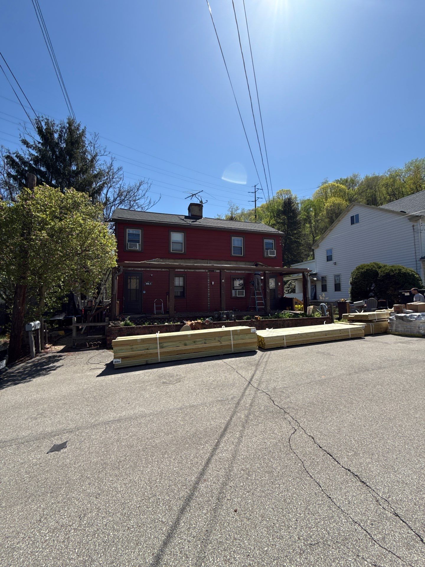 Roof sunspace deck  by Cousins Roofing Siding & Decks