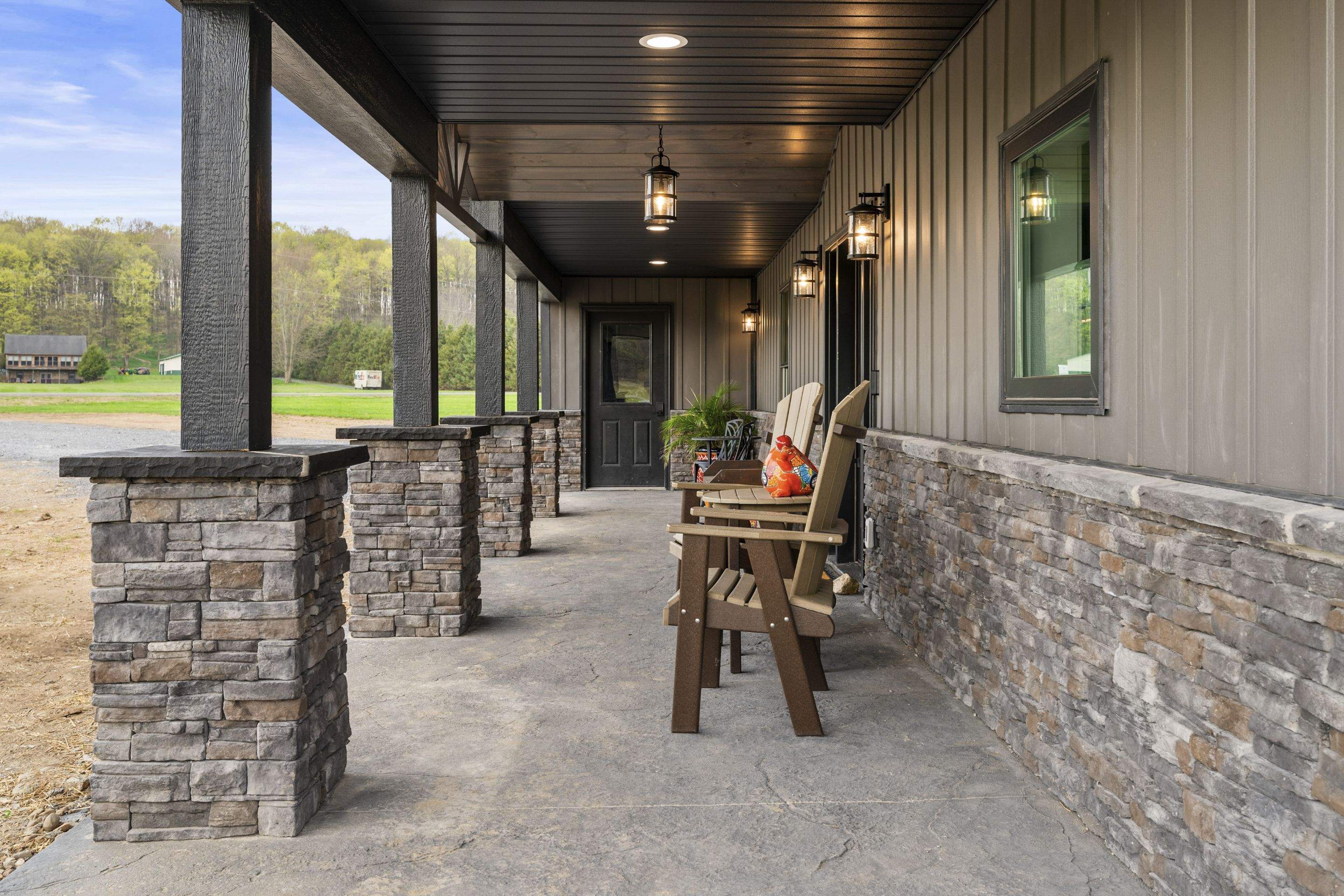 Barndominium  using Textured Board & Batton by Horst Custom Homes 