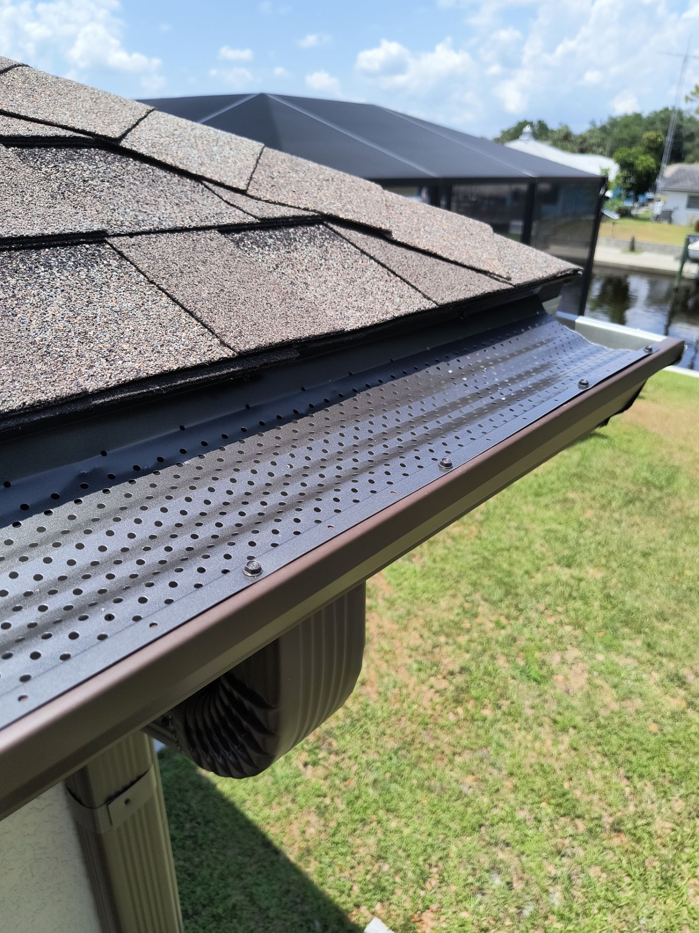 Custom Seamless Gutters and Downspouts for Large Homes in Tampa FL by Gutter Professor by Gutter Professors