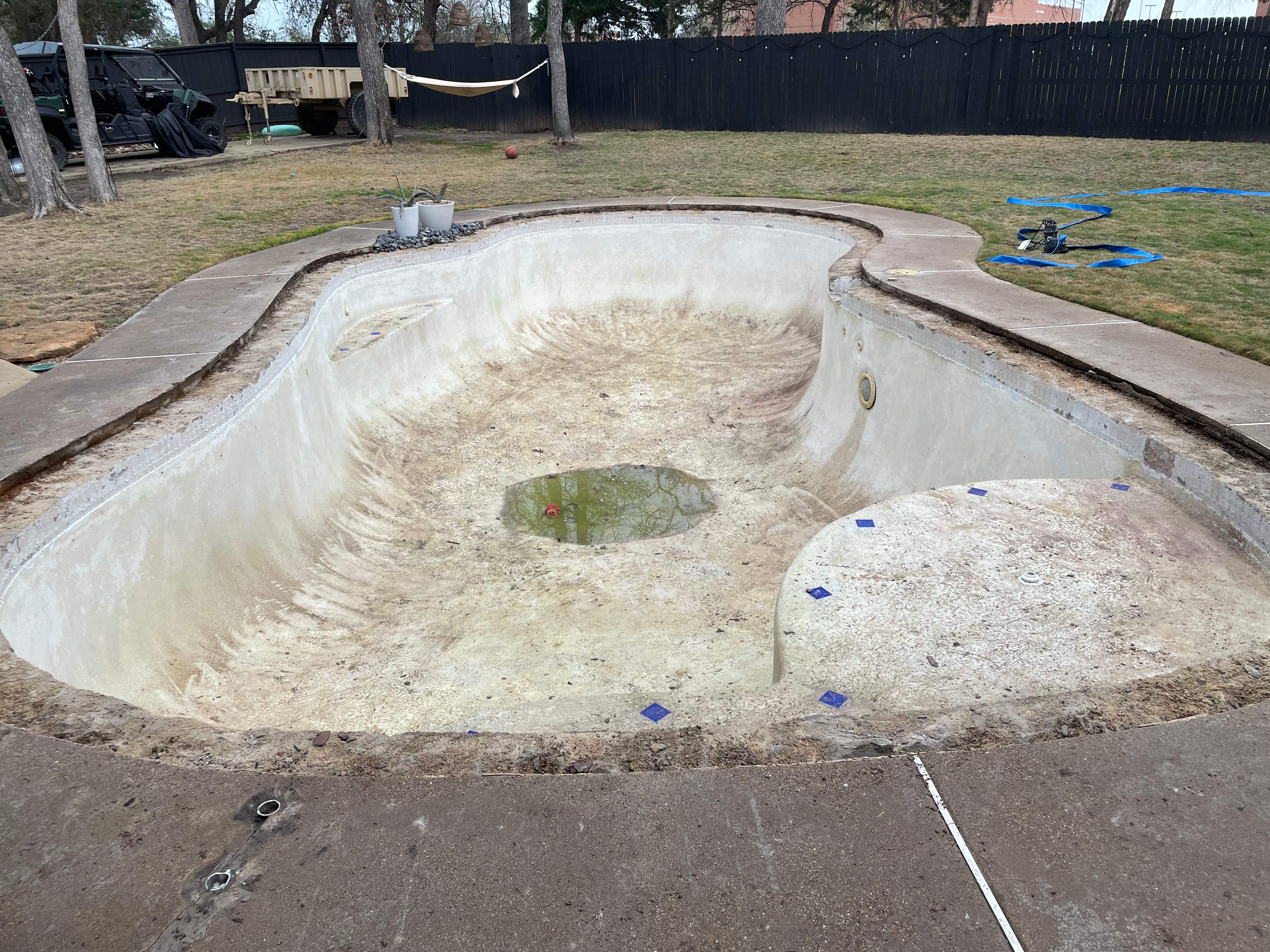 Freeform Pool with Raised Spa and Natural Stone Deck by Pinnacle Pools and Spas - DFW