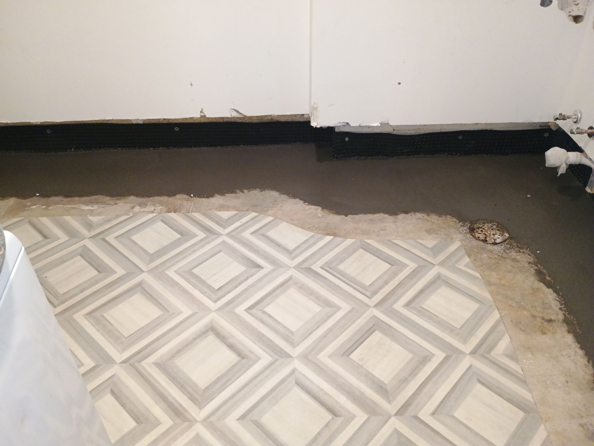 Interior Drain Tile & Buried Discharge in St. Anthony, MN by Waterproofing Northeast