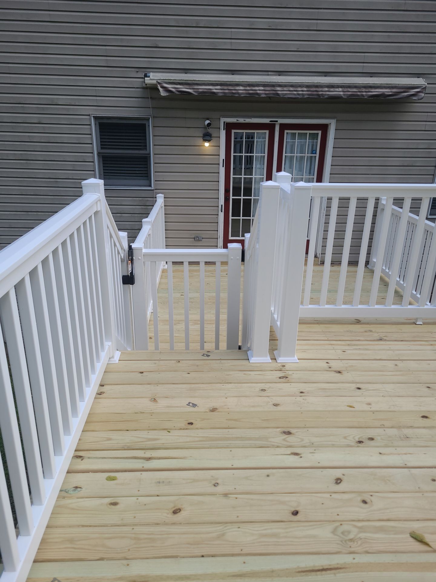 Pressure Treated Wooden Deck by Wyomissing Construction LLC 