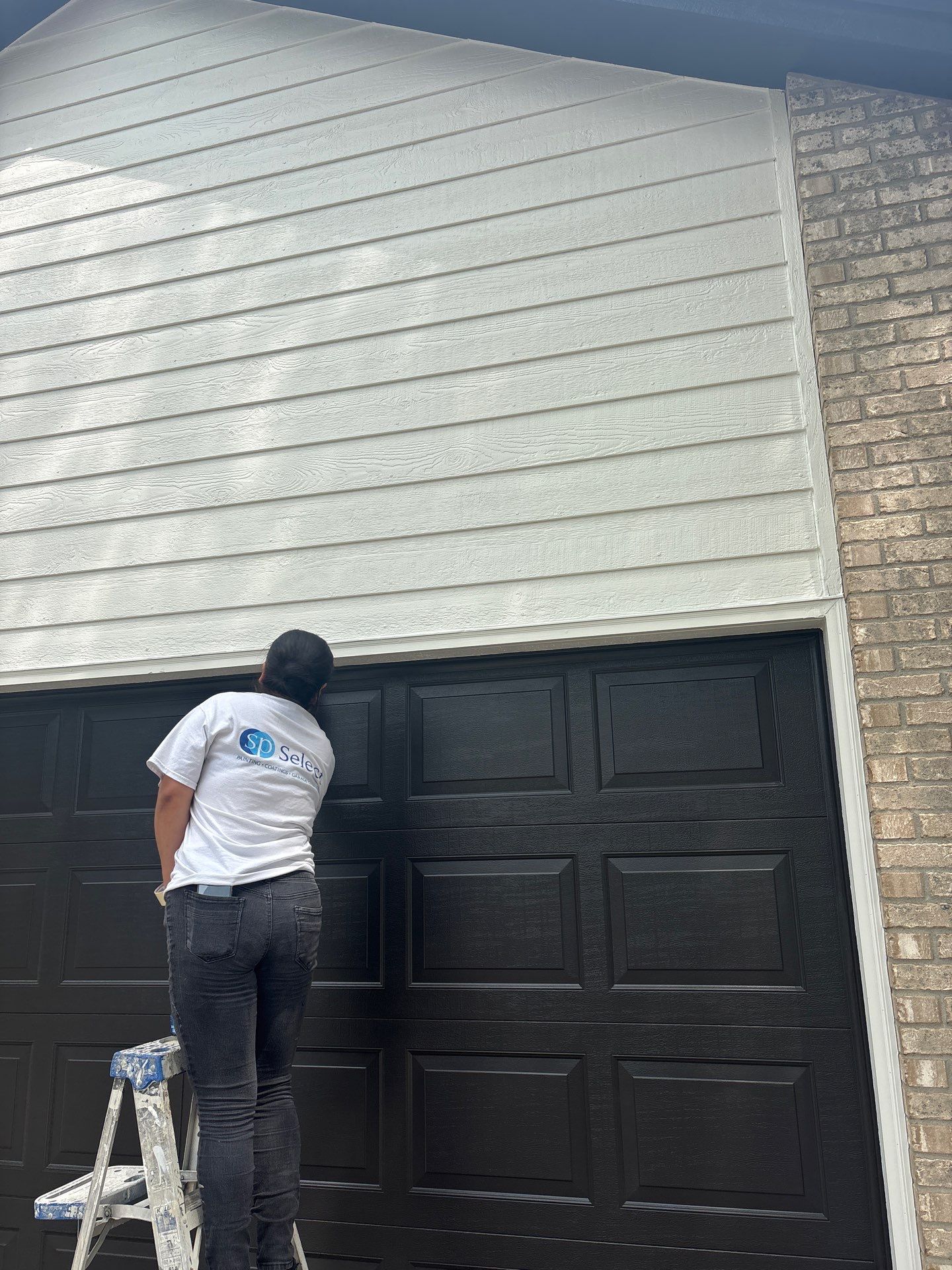 Residential Exterior Painting and Siding Refresh in Sioux Falls by Select Painting, Coatings & Garage Cabinets