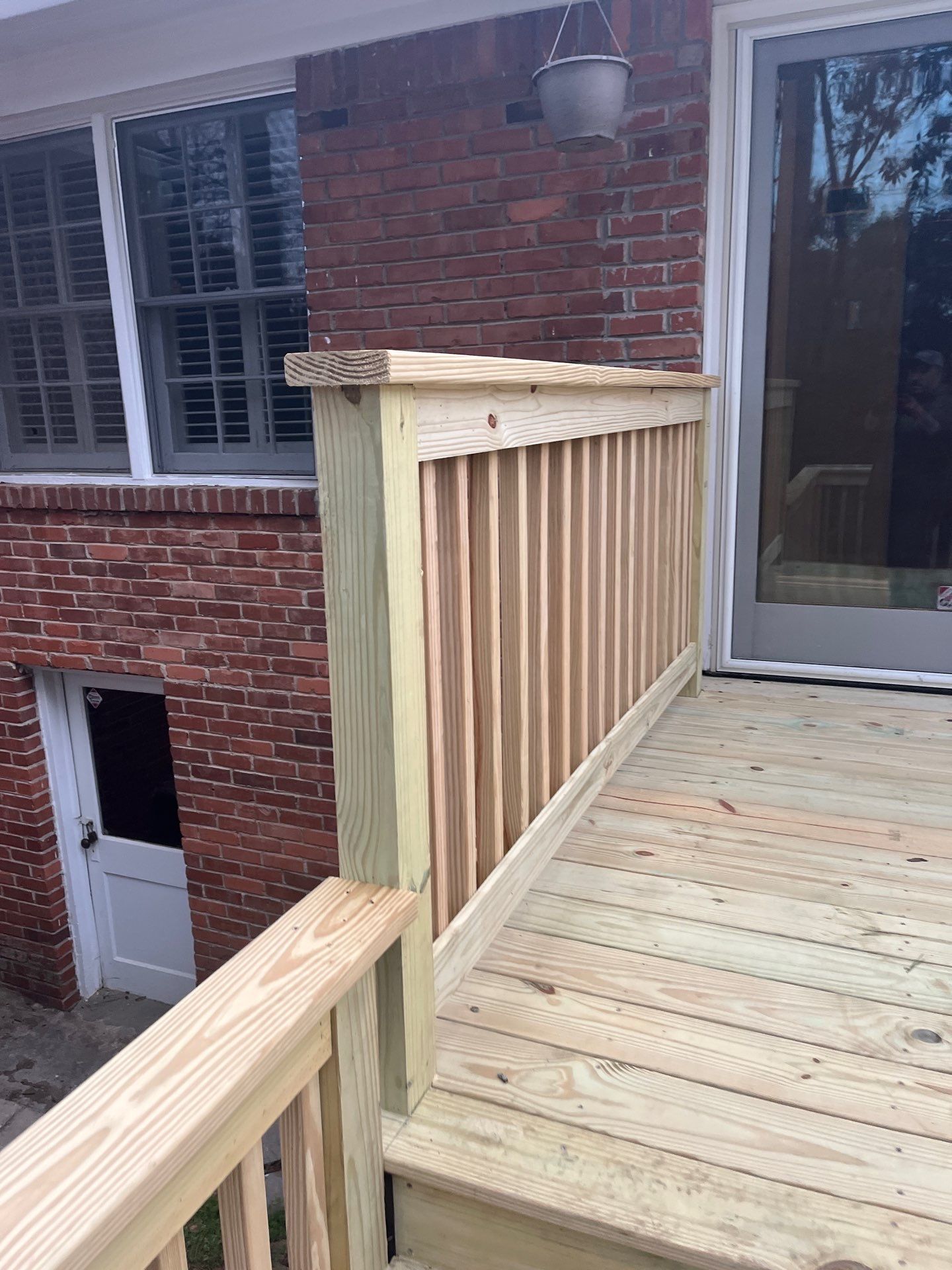 Wood Deck Resurface with Privacy Wall in Buckhead, GA by Nelson Exteriors