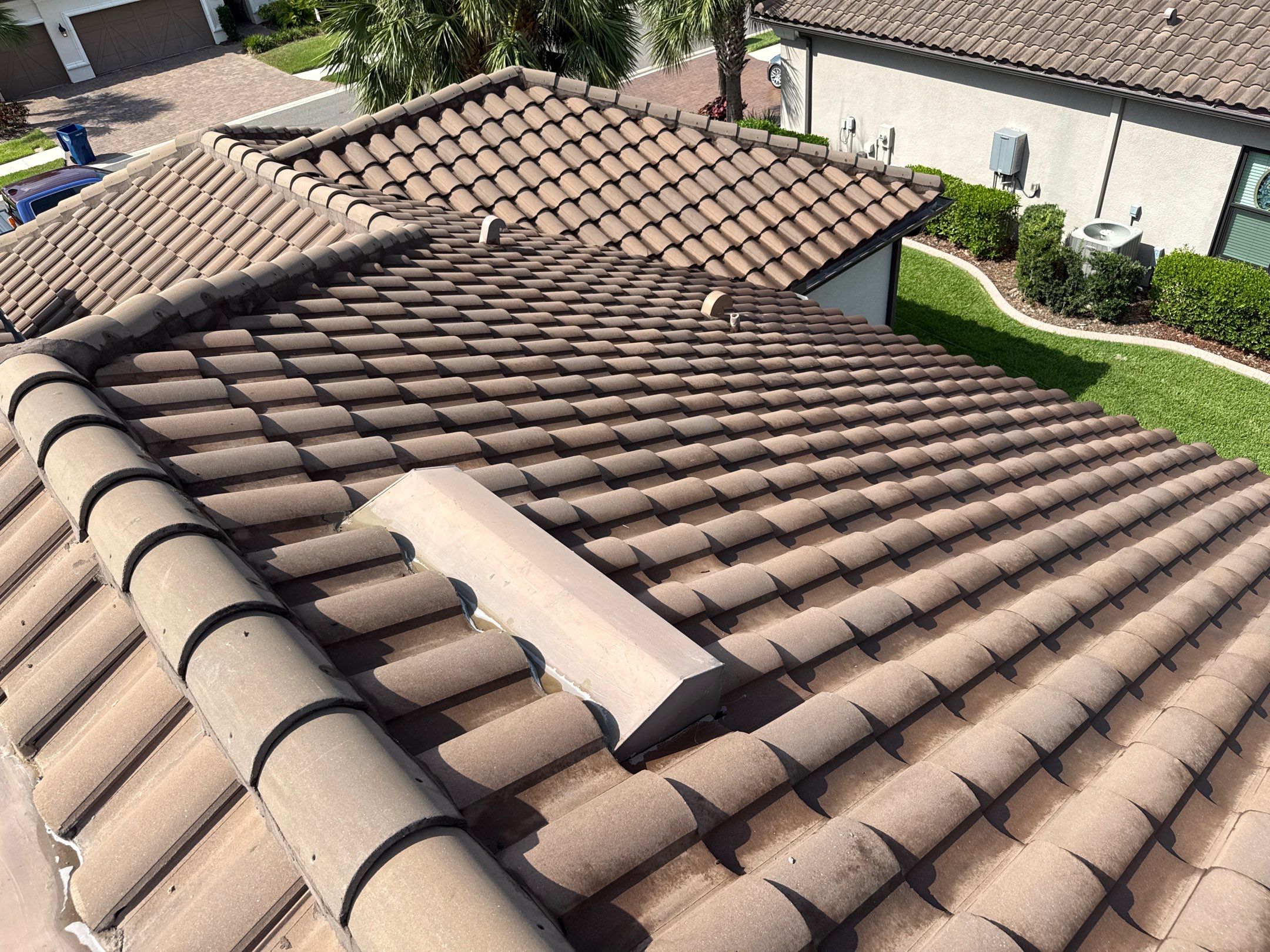 Soft Wash Roof Cleaning – Concrete Tile Roof | Artisan Lakes Esplanade, Palmetto, FL by Sunshine AquaWash