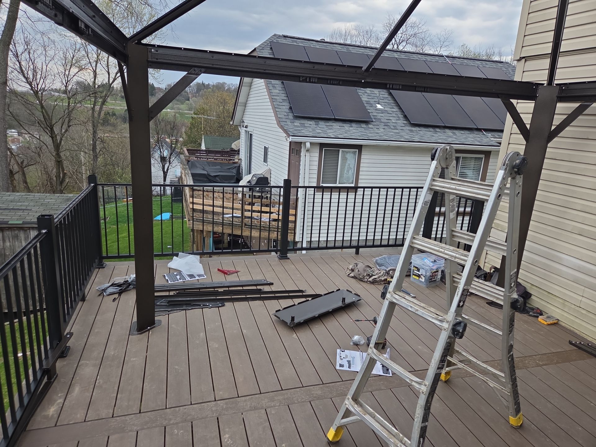Custom Composite Deck and Wood-Plank Stamped Concrete Patio in Pittsburgh by Cousins Roofing Siding & Decks